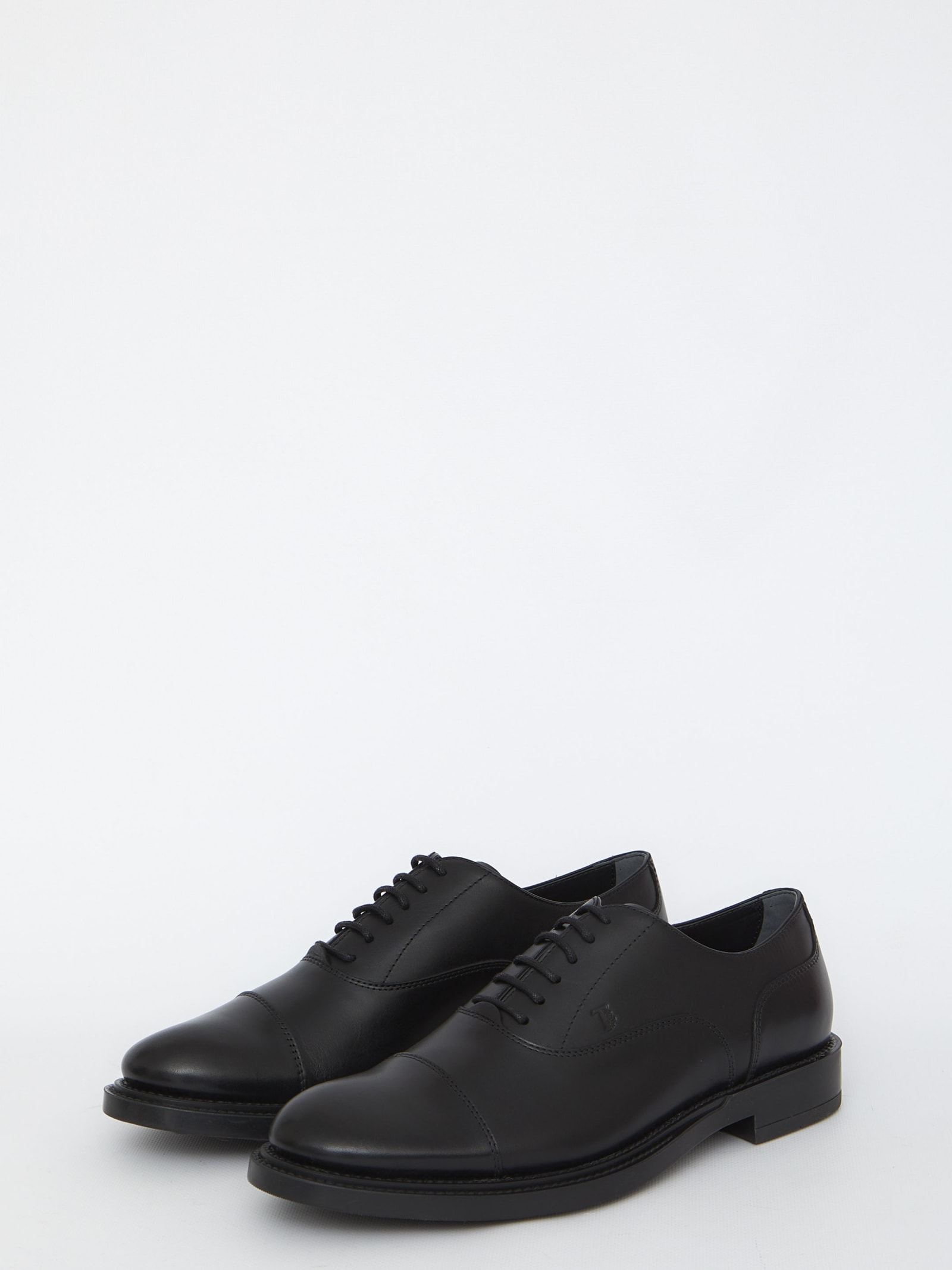 Shop Tod's Lace-ups In Black Leather