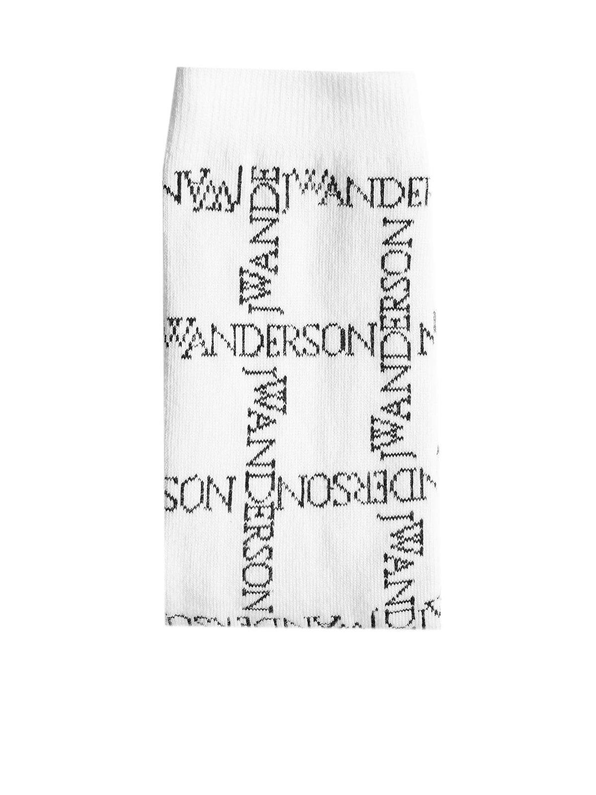Shop Jw Anderson Monogram-knitted Stretched Socks