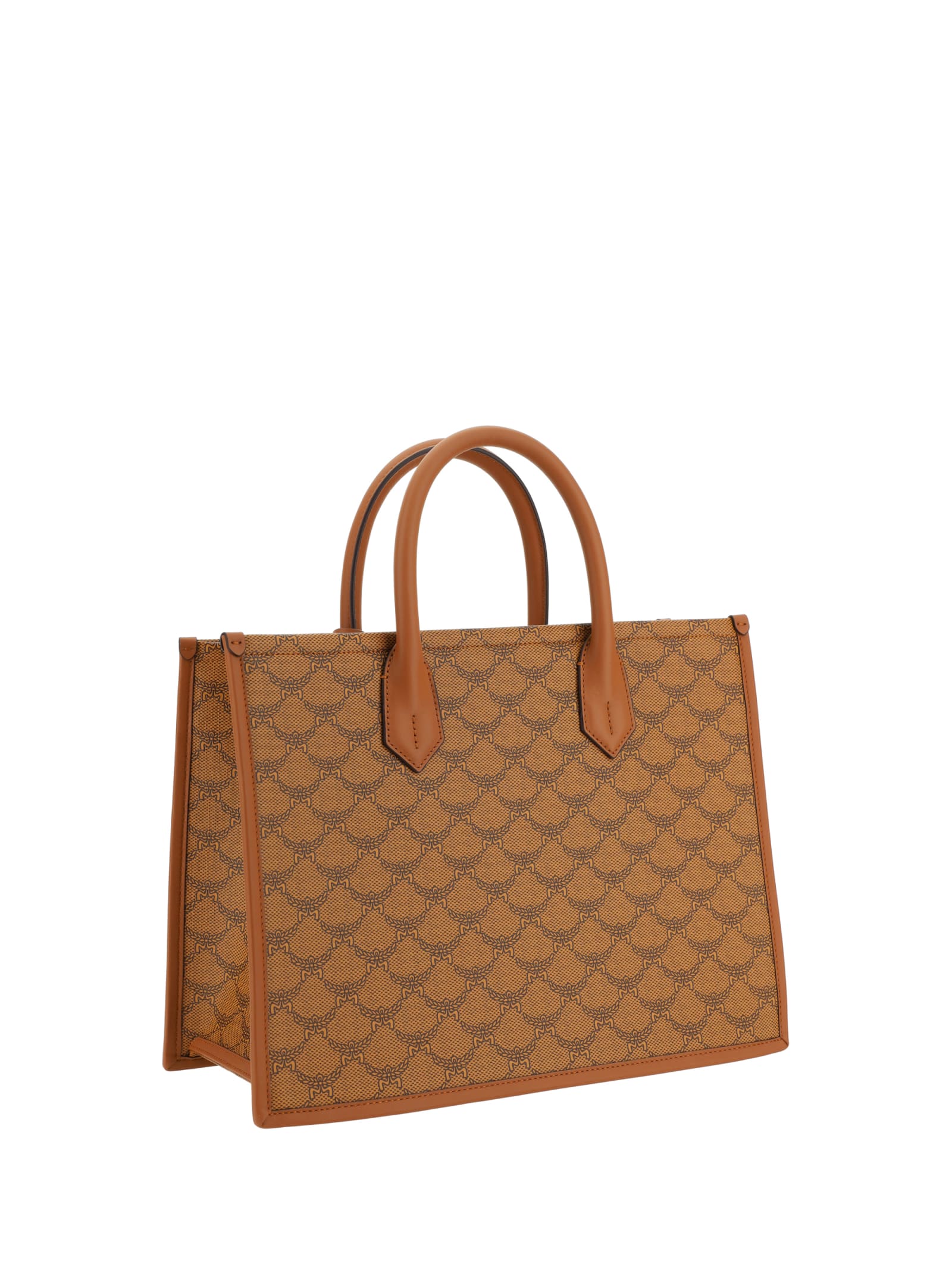 Shop Mcm Handbag In Cognac