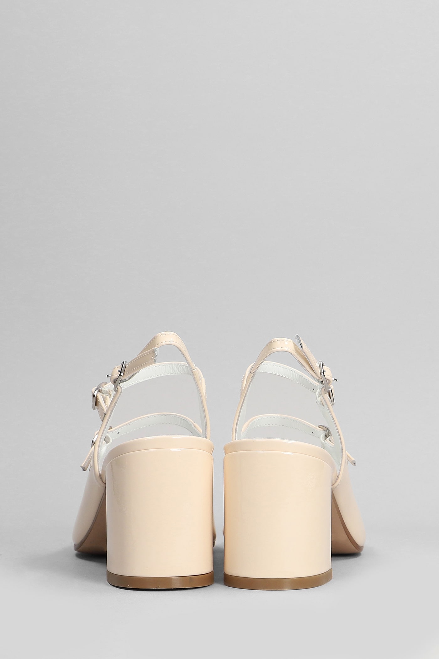Shop Carel Banana Pumps In Beige Patent Leather