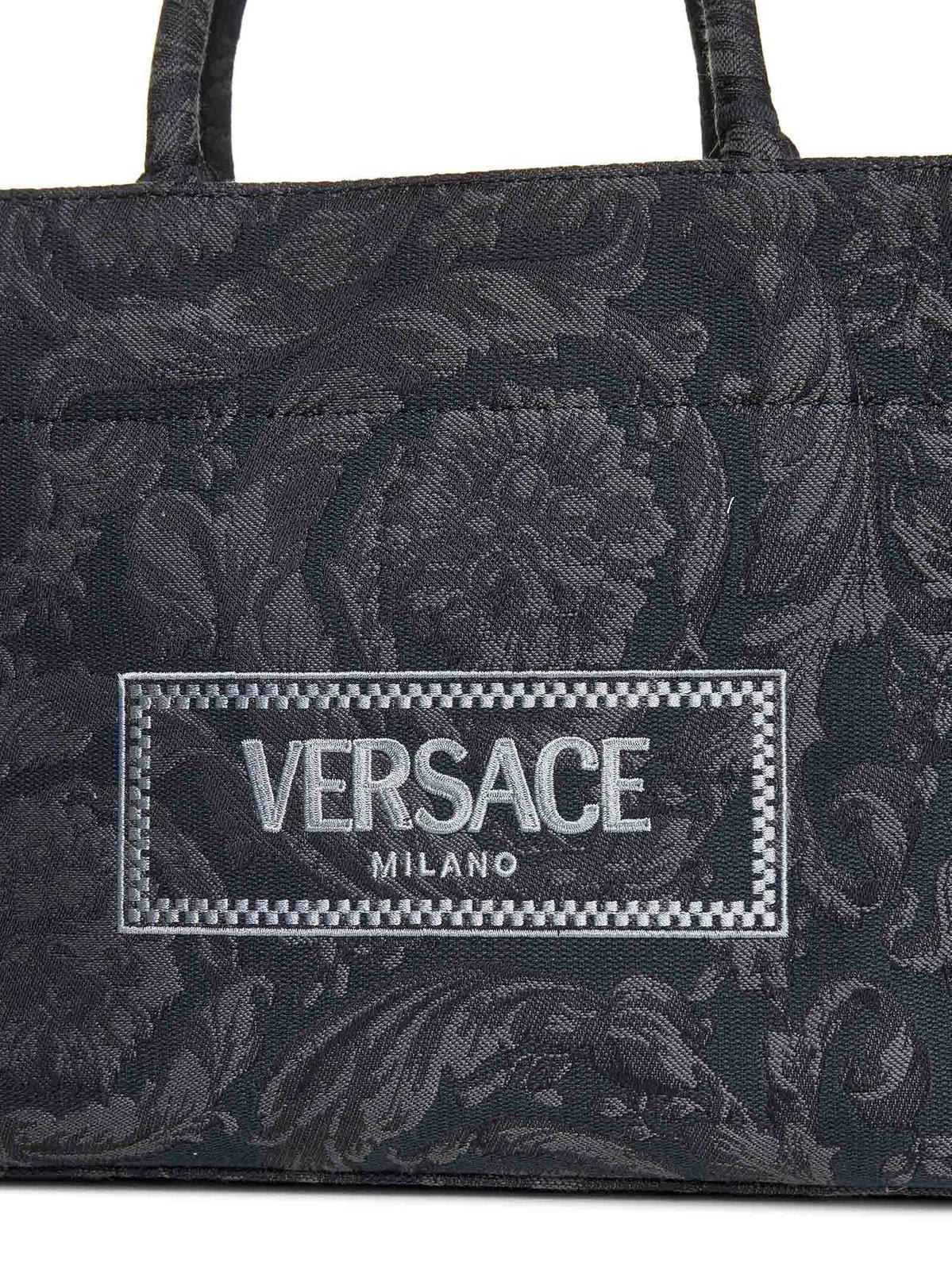 Versace All-over Floral Motif Top Handle Bag In Black+black--gold