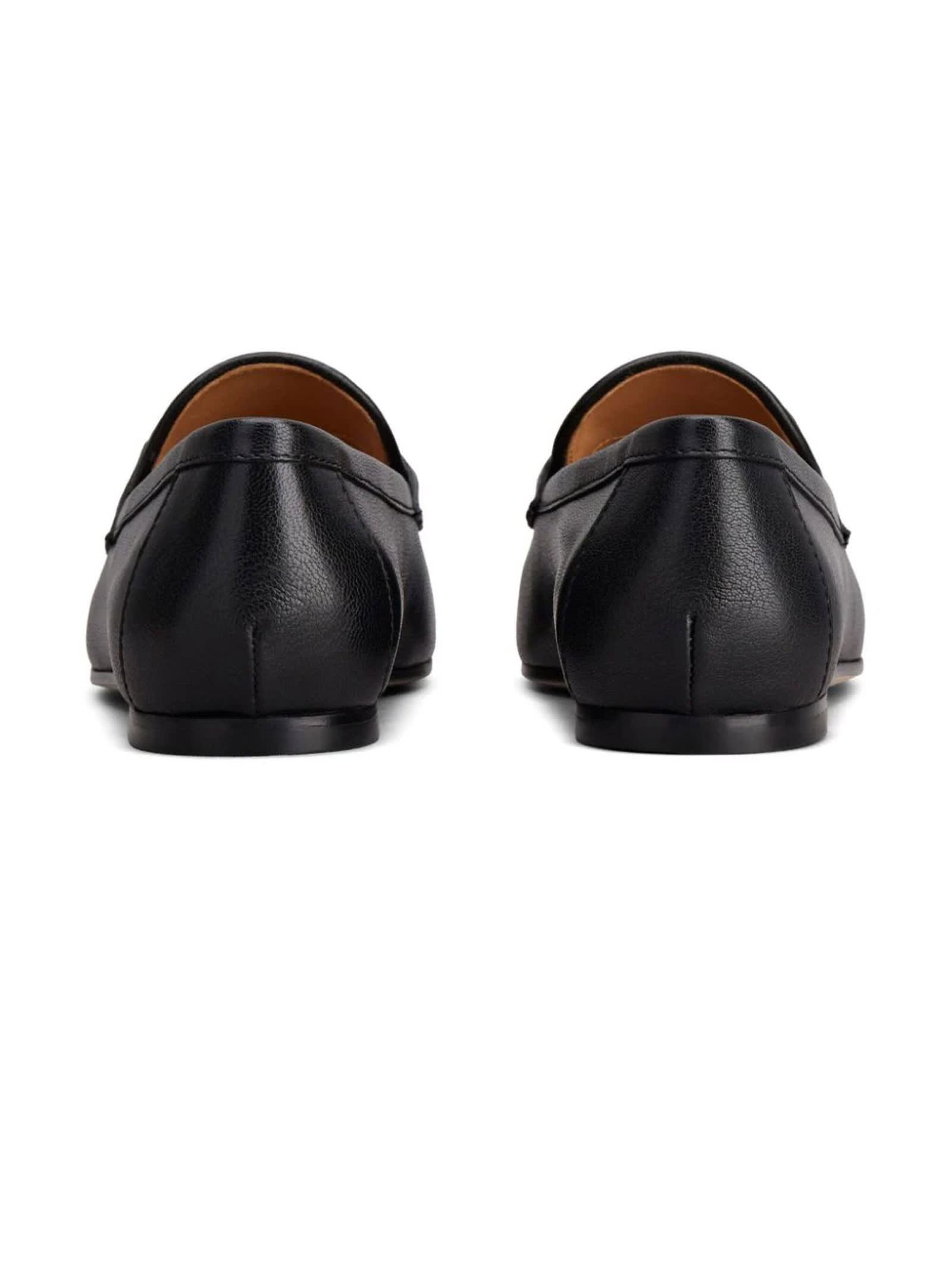 Shop Tod's Loafers In Black Leather