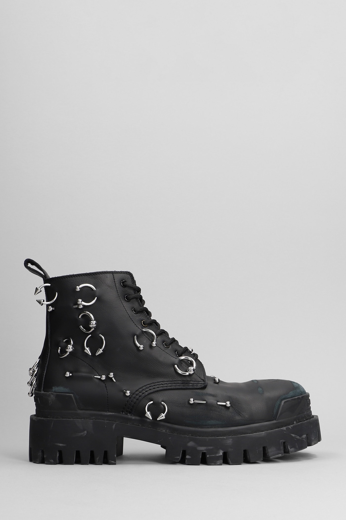 Shop Balenciaga Strike Piercing Combat Boots In Black Leather