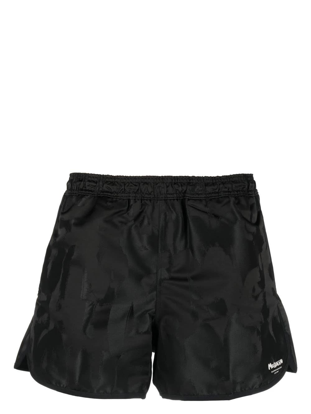 Alexander Mcqueen Solid Color Swim Shorts With Graffiti Print In Nero