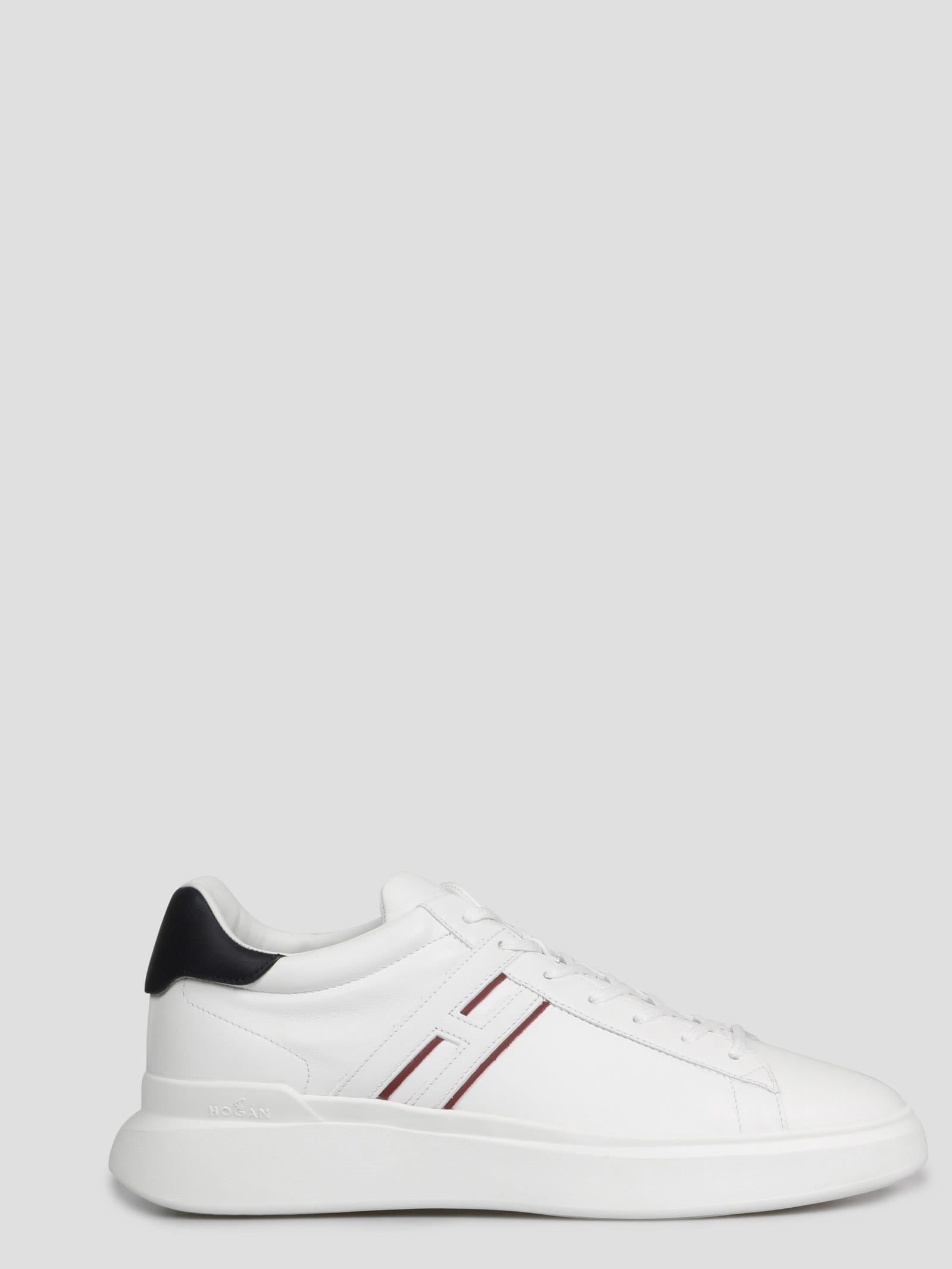Shop Hogan H580 Slash Sneakers In White