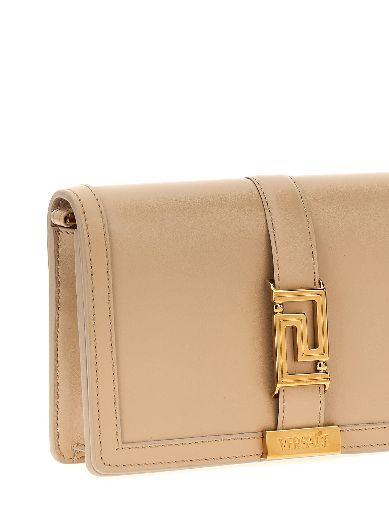 Shop Versace Greca Goddess Clutch In Beige