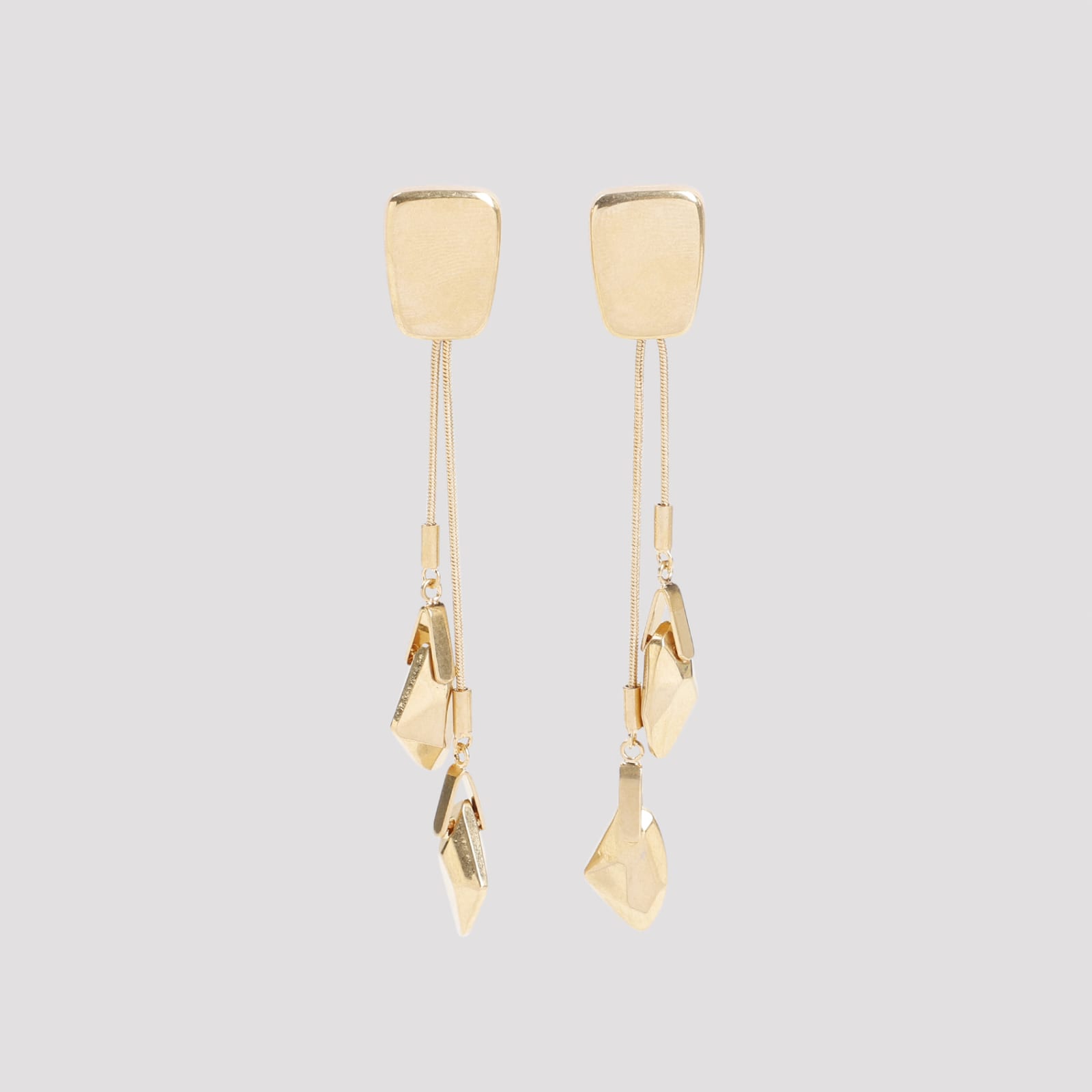 Shop Tom Ford Brass Earrings In Vintage Gold