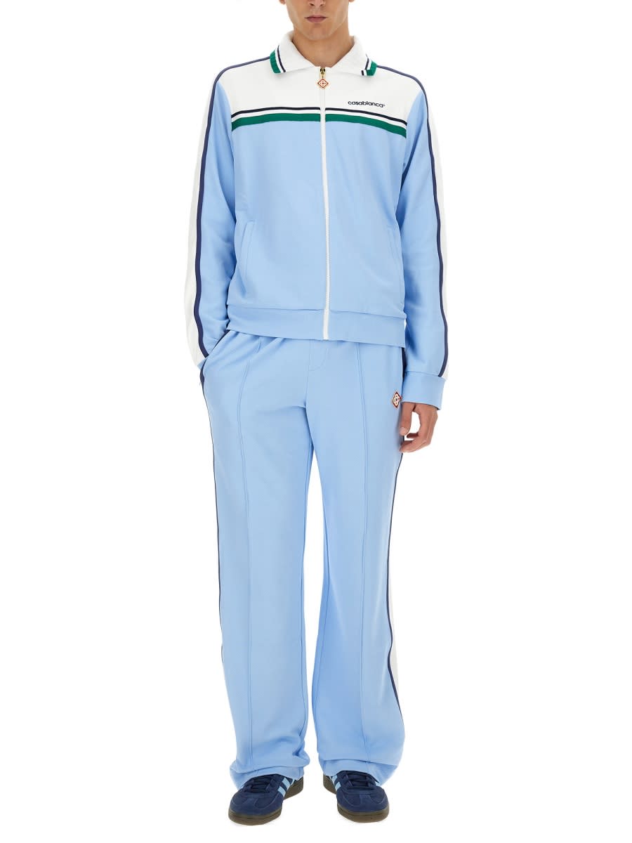 Shop Casablanca Pants With Logo Band In Pale Blue