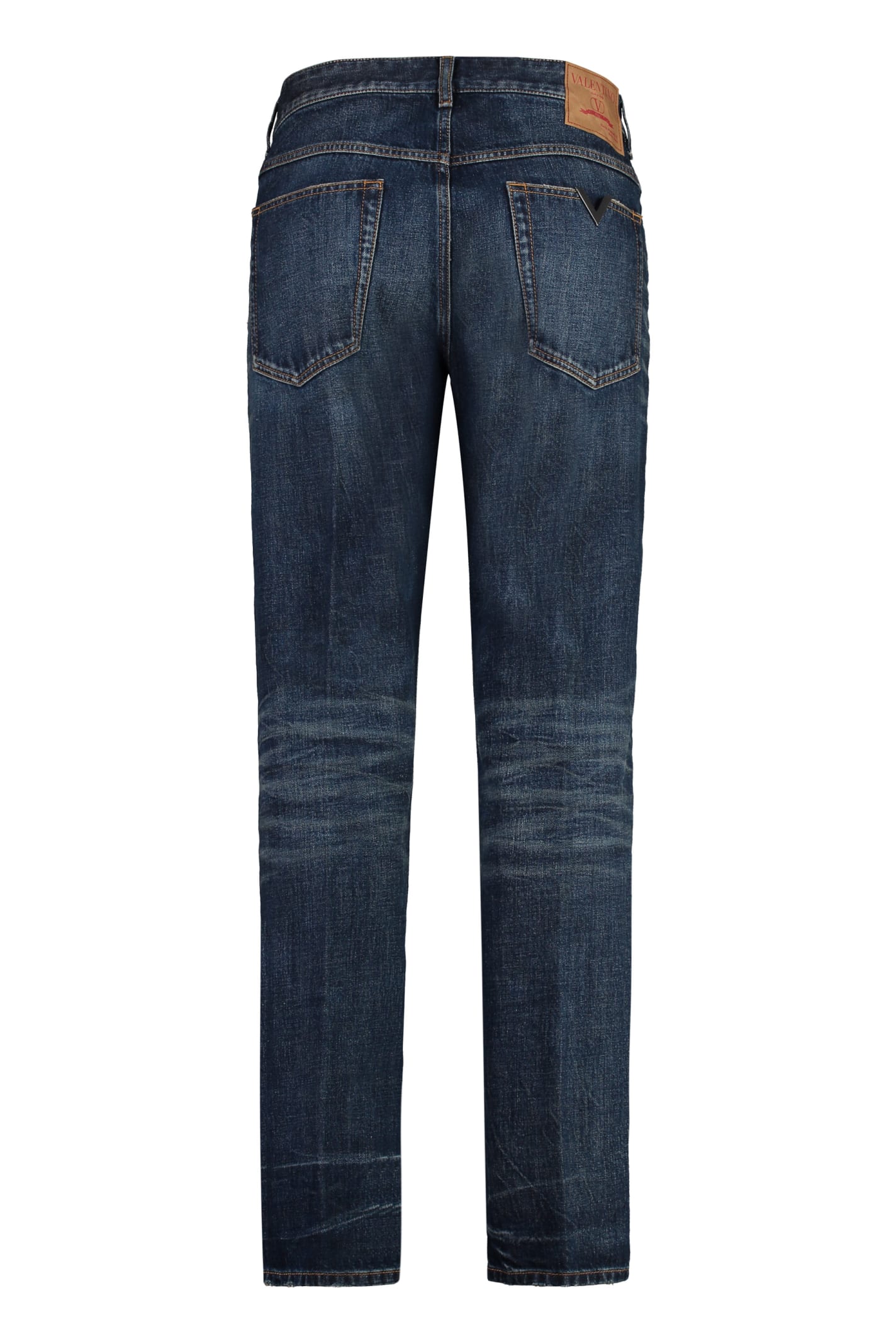 Shop Valentino Carrot-fit Jeans In Denim