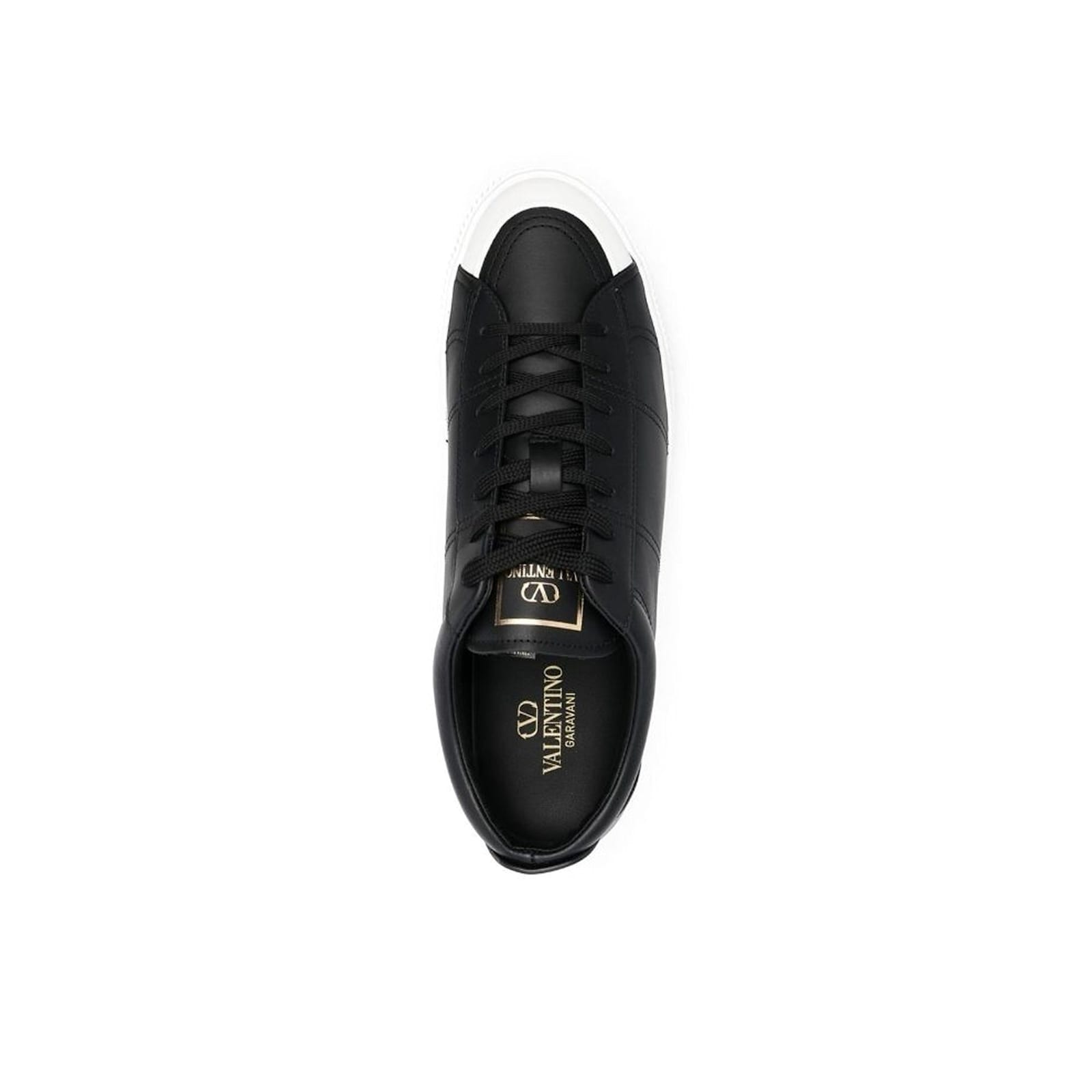 Shop Valentino Garavani Leather Sneakers In Black