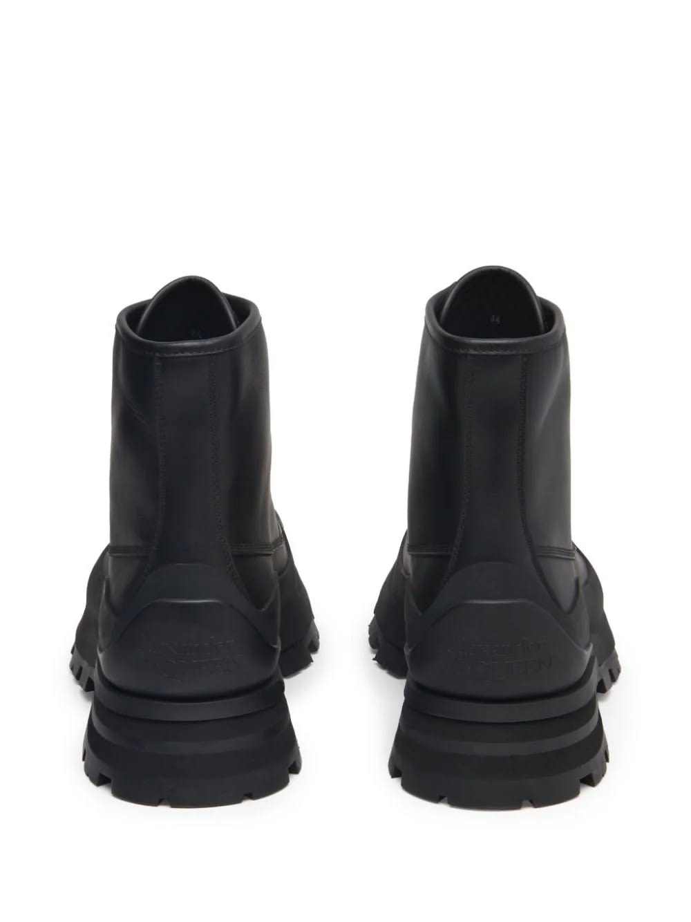 Shop Alexander Mcqueen Wander Ankle Boots In Black Leather