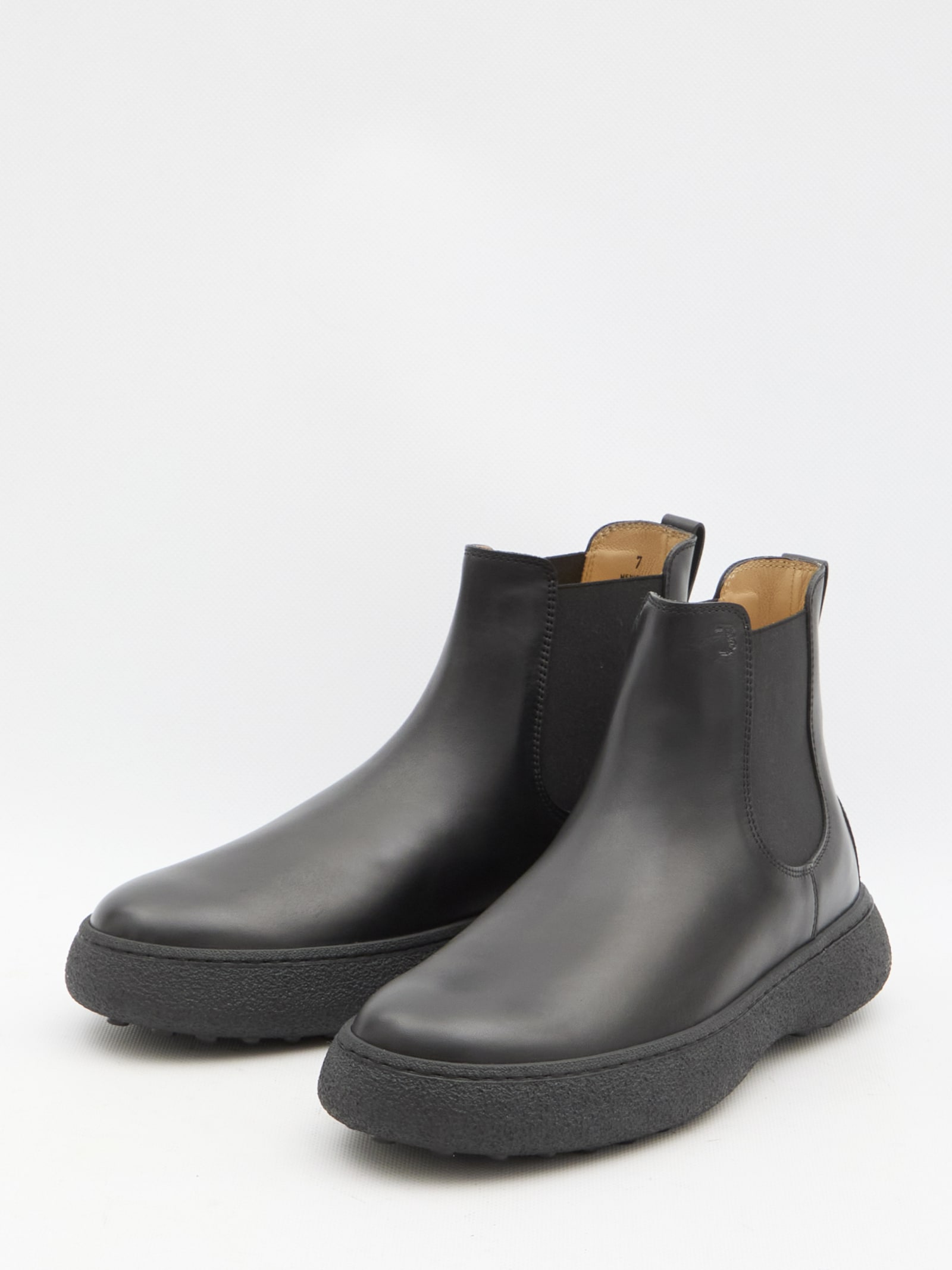 Shop Tod's Leather Chelsea Boots In Black