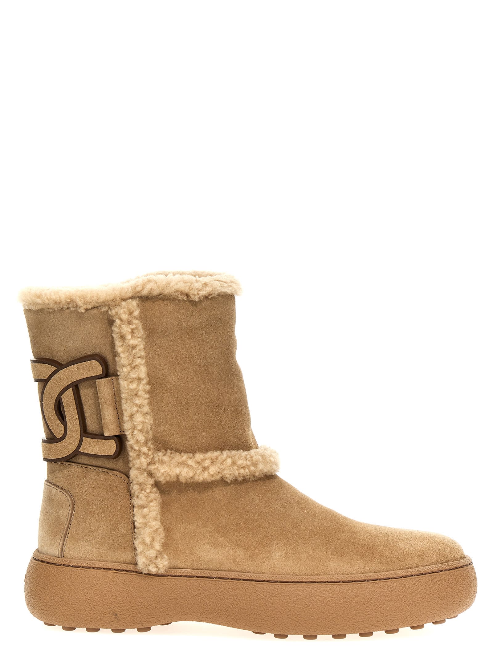 Shop Tod's Winter Gommini Boots In A Beige