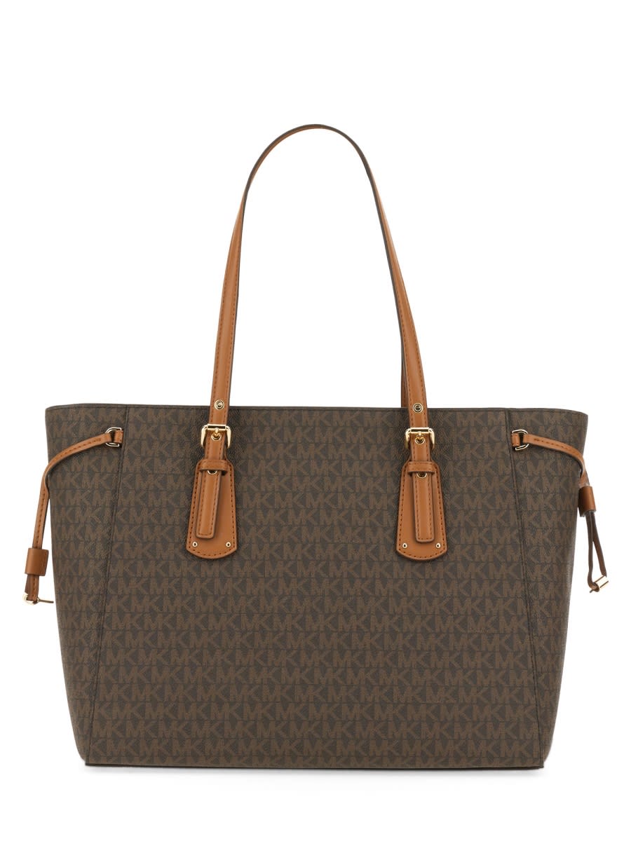 Shop Michael Kors Voyager Medium Tote Bag In Brown