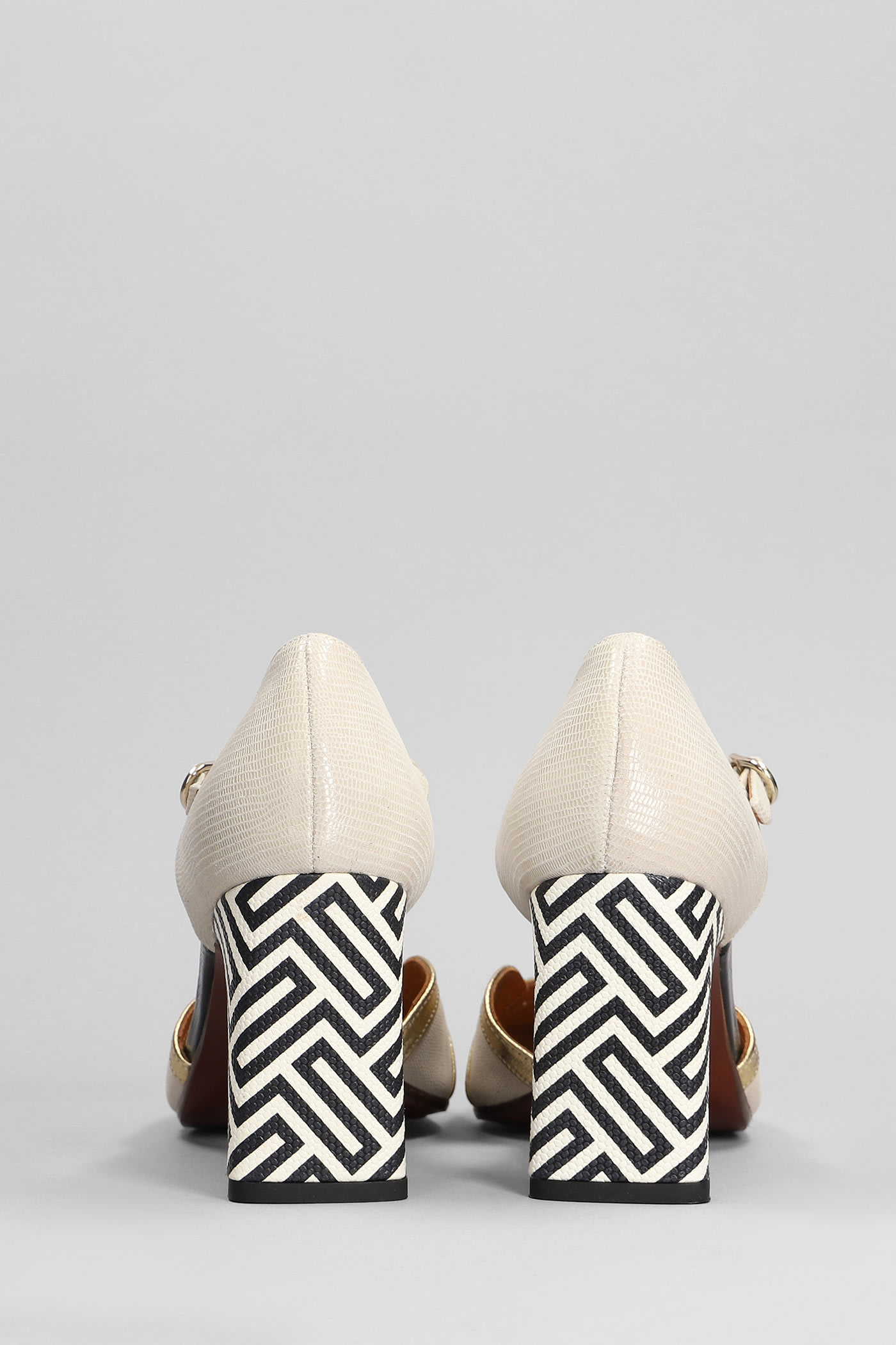 Shop Chie Mihara Olali Pumps In Beige Leather