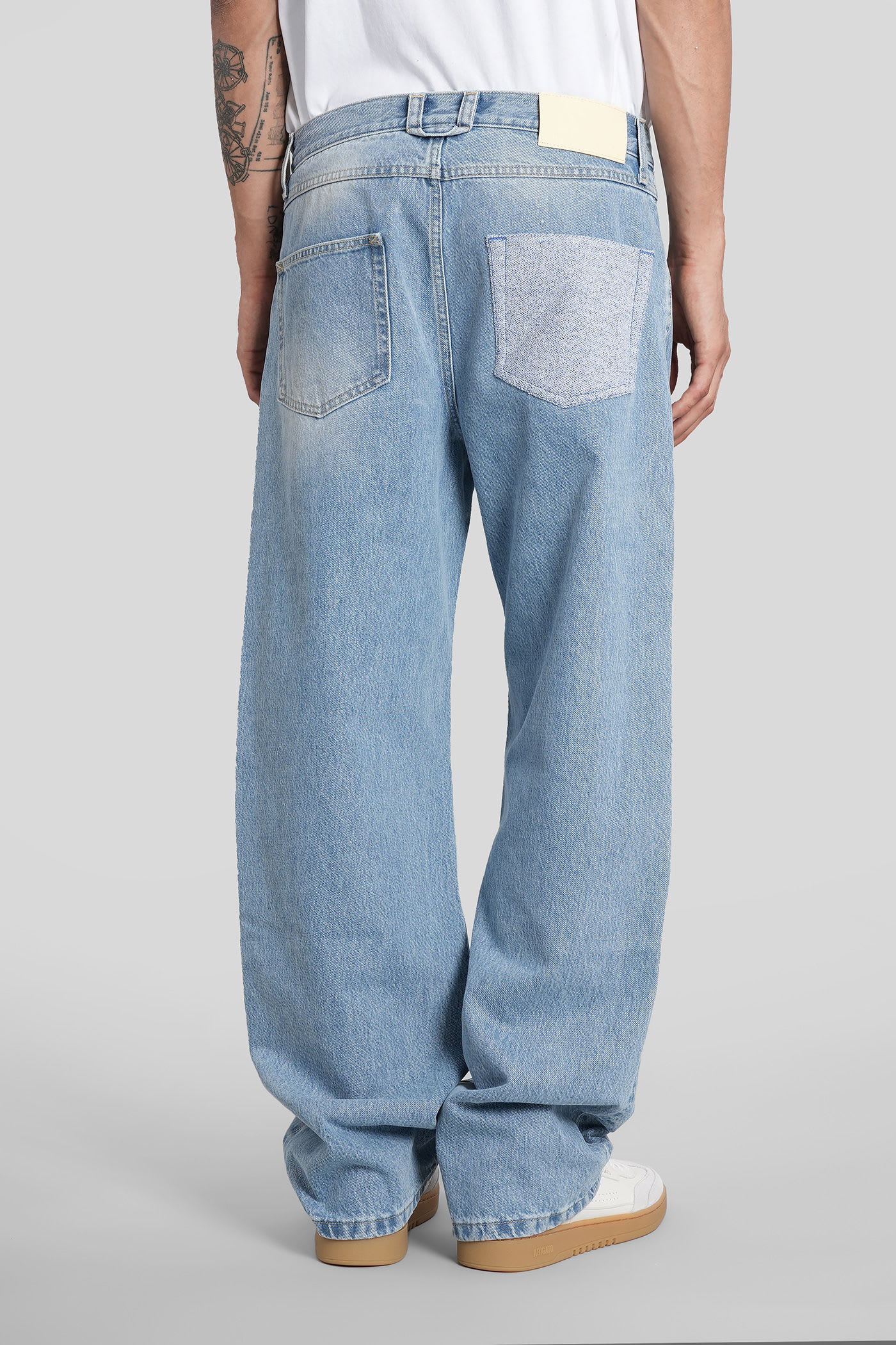 Axel Arigato Zine Embroidered Jeans In Cyan Denim In Blue