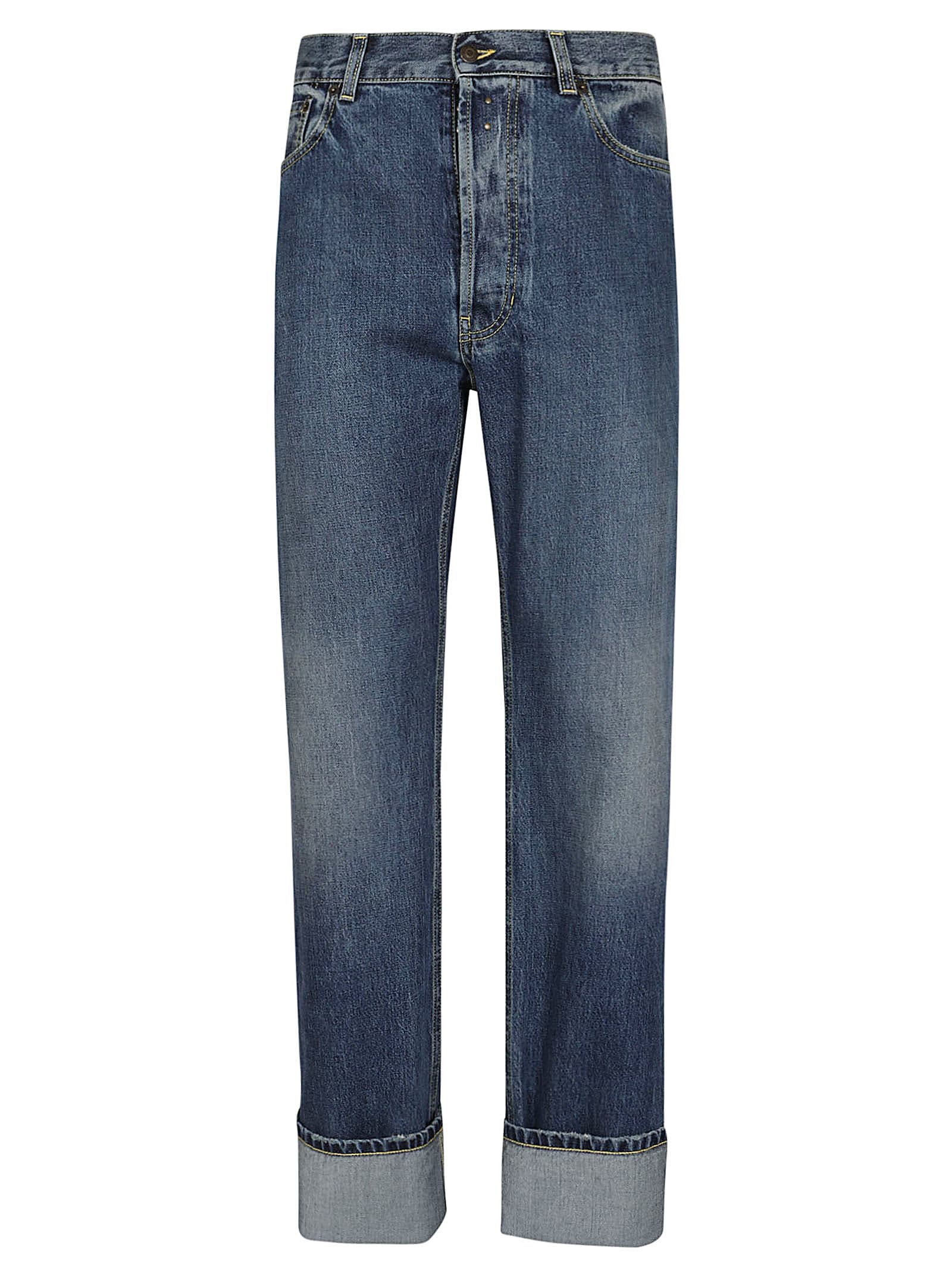 Shop Alexander Mcqueen Turn Up Jeans In Blue Washed