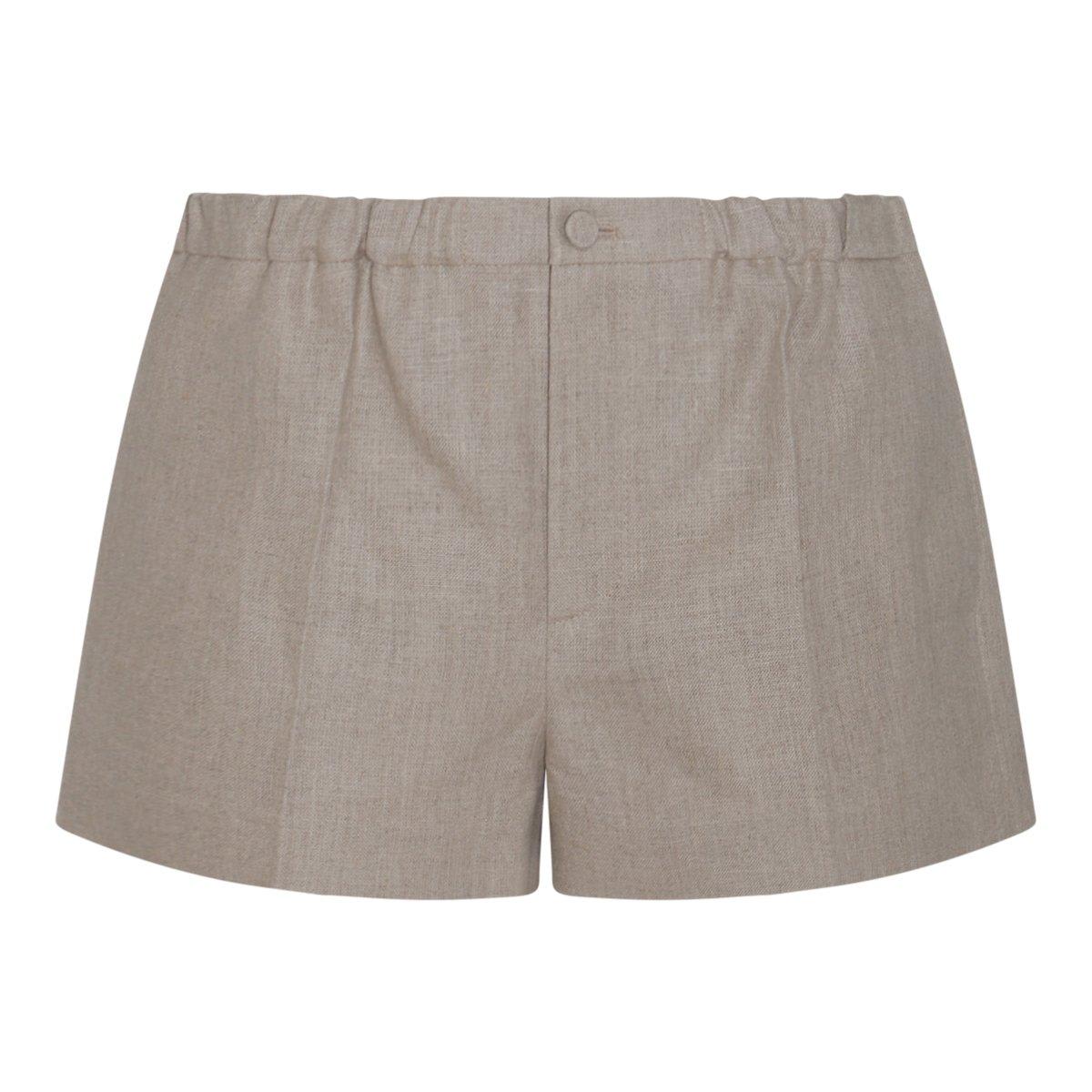 Shop Valentino Mid-rise Pleated Shorts In Beige