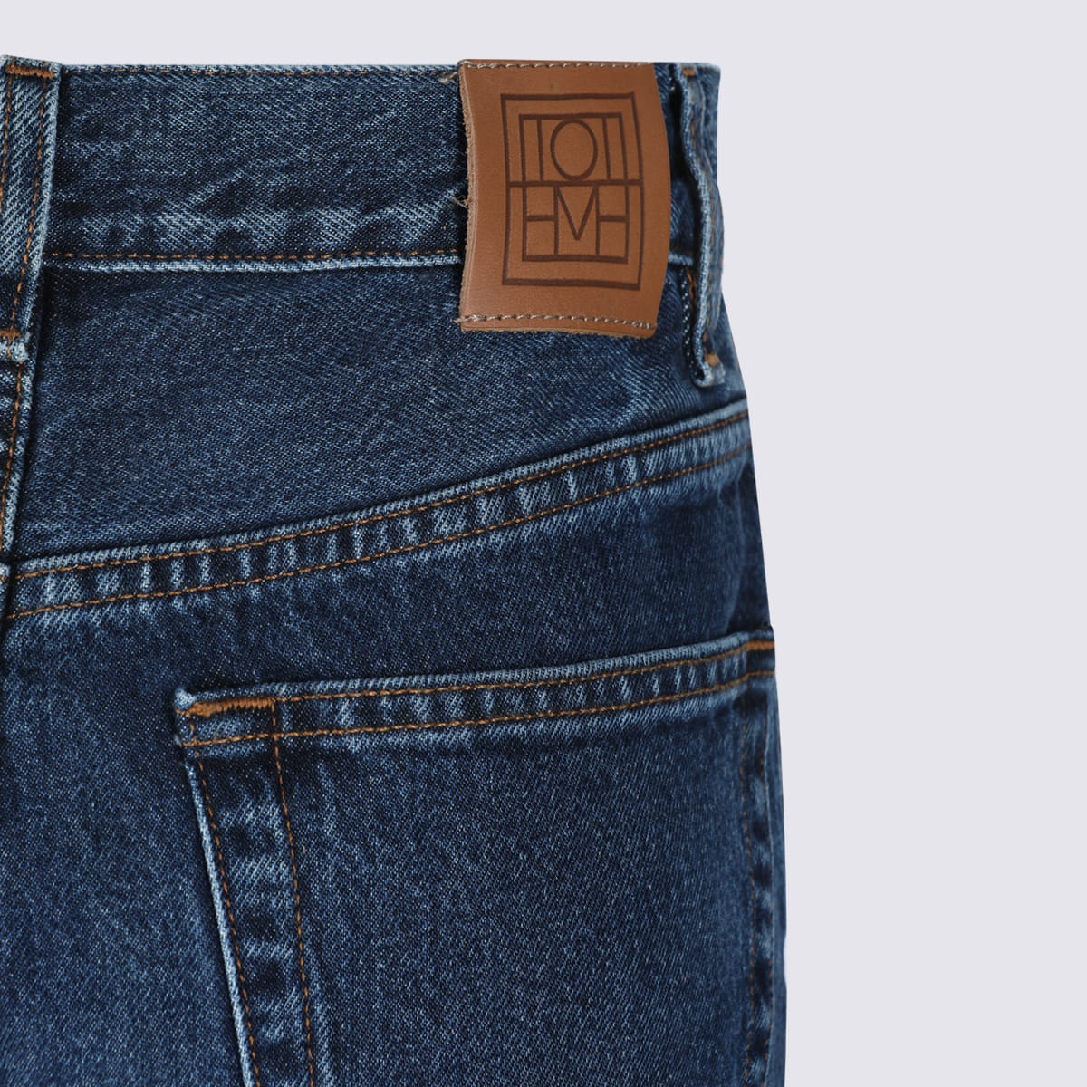 Totême High Waist Loose Leg Denim Trousers In Blue