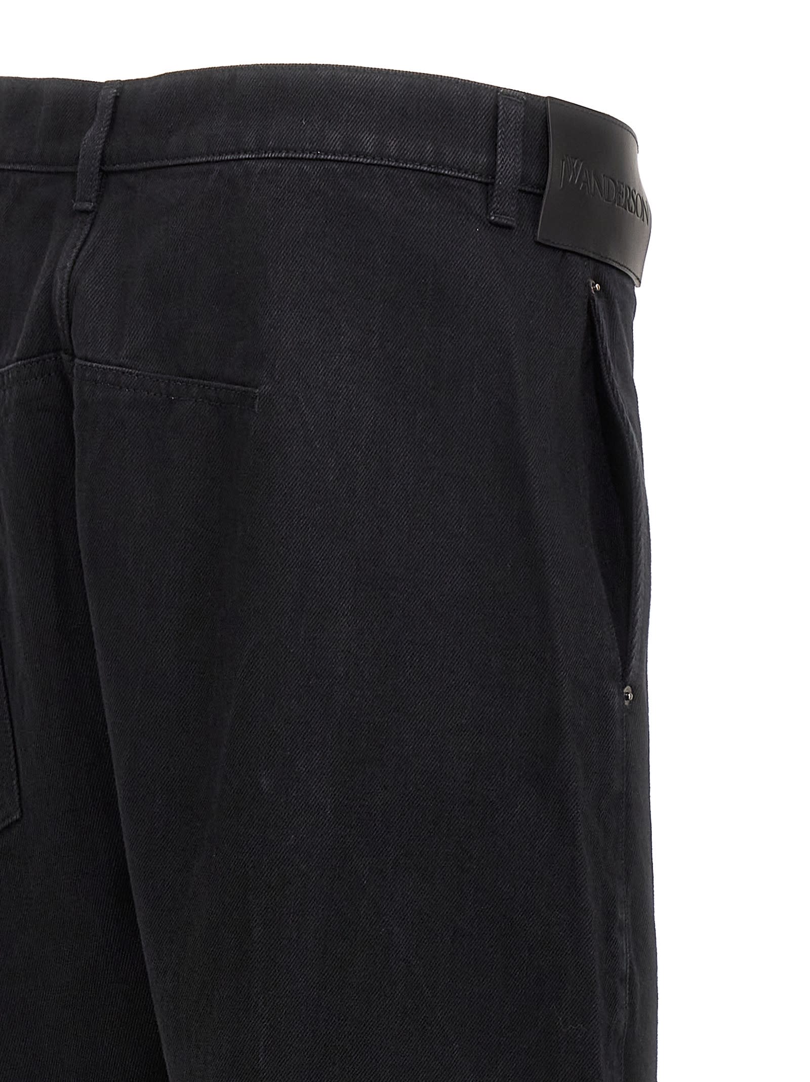 Shop Jw Anderson Twisted Workwear Jeans In Black