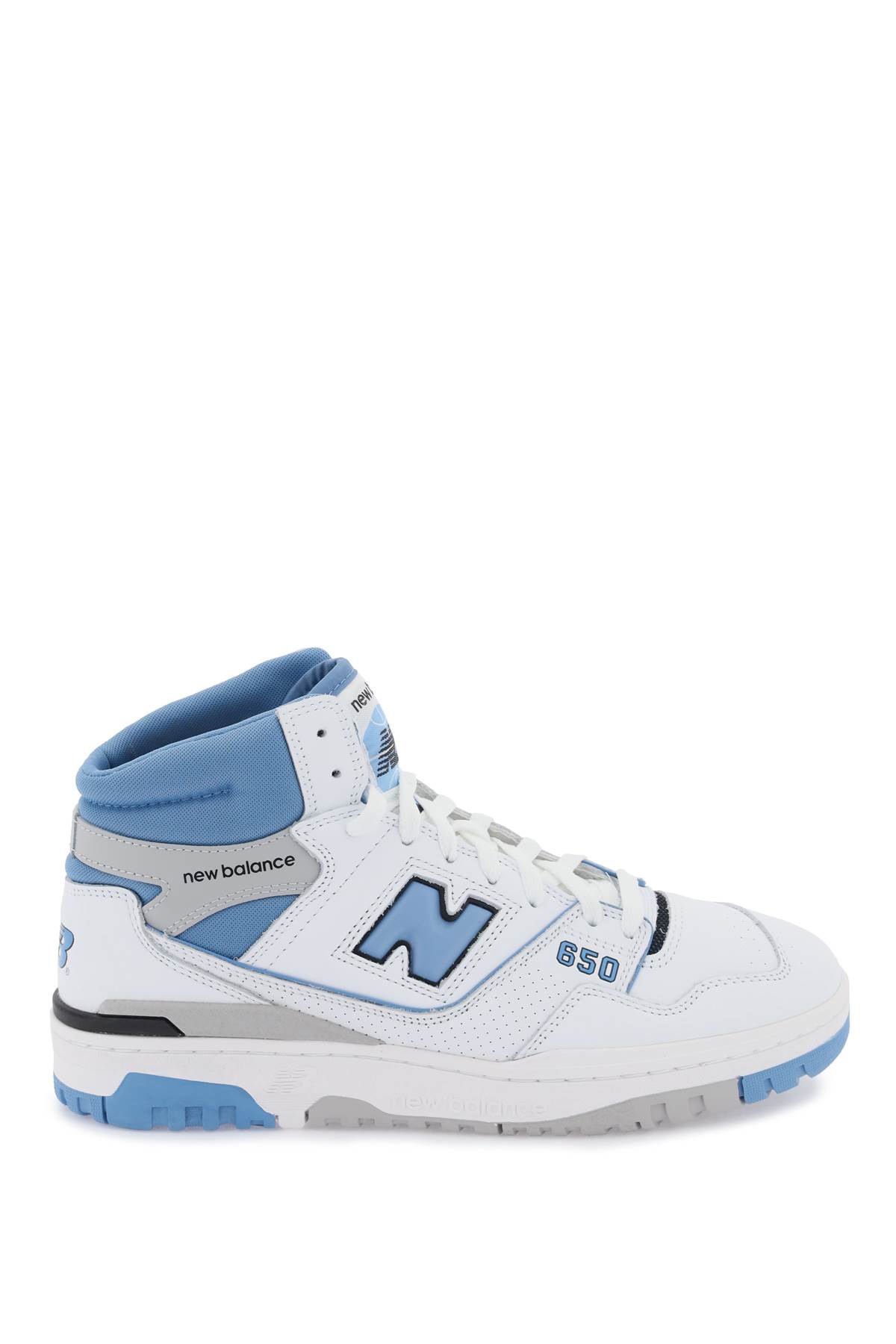 Shop New Balance 650 Sneakers In White
