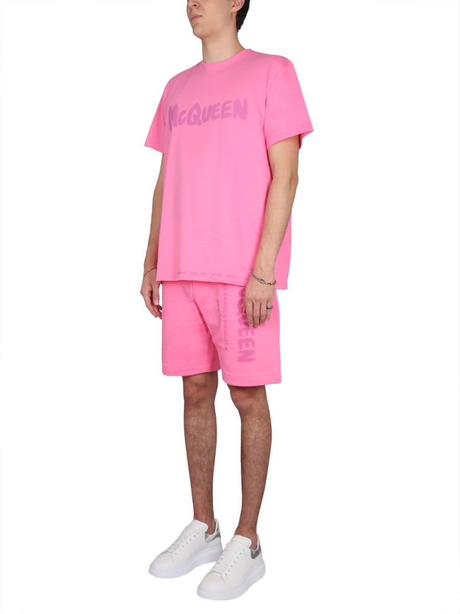 Shop Alexander Mcqueen Bermuda Shorts With Graffiti Logo Print In Pink