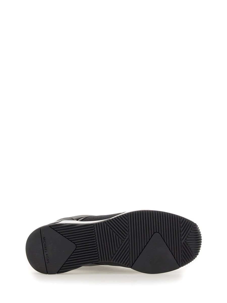 Shop Michael Kors Georgie Sneaker In Black