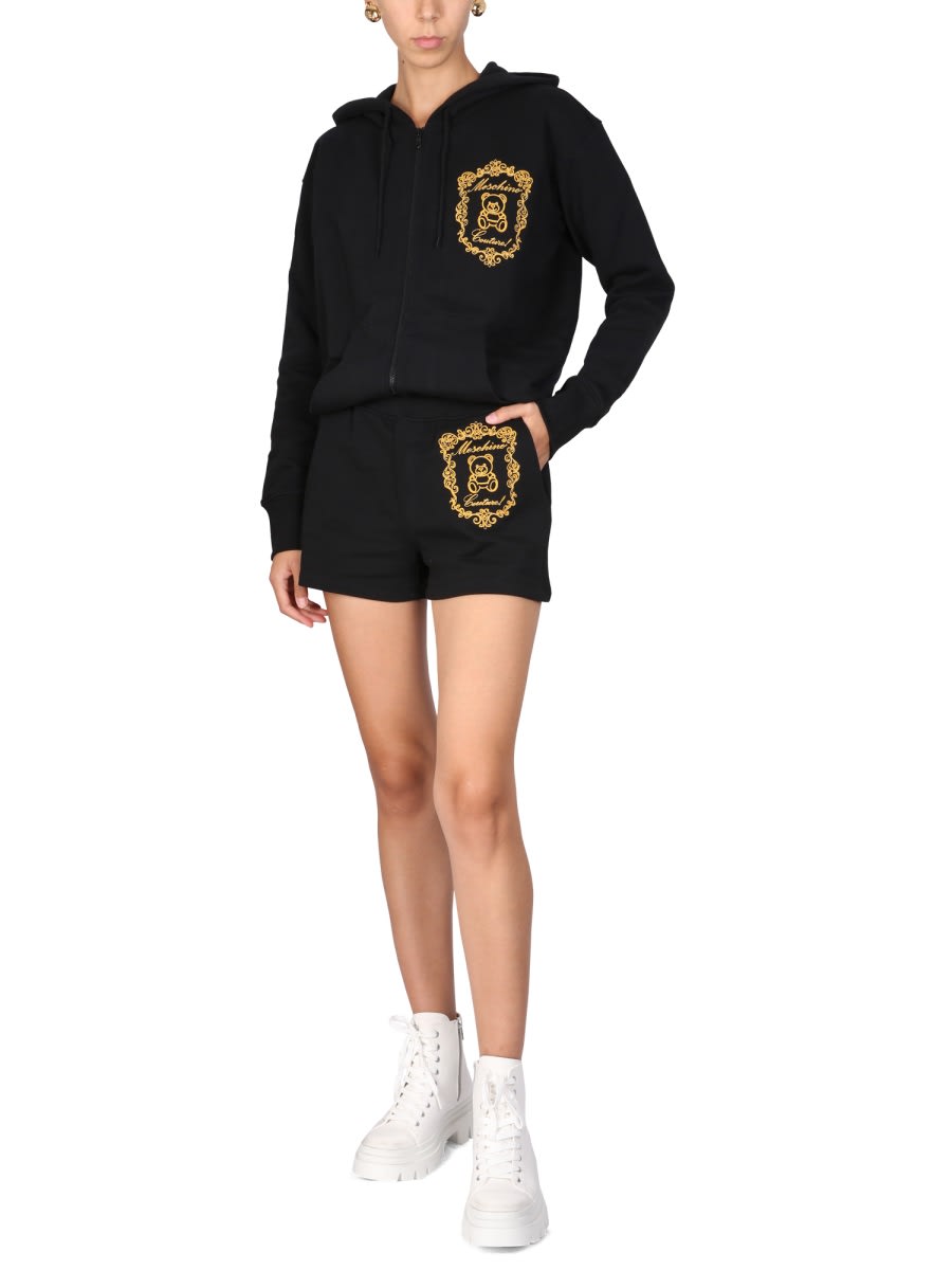 Shop Moschino Shorts With Logo In Black