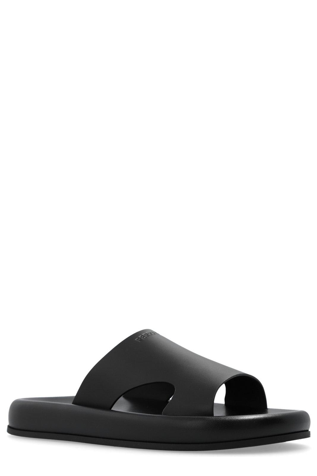 Shop Ferragamo Logo Debossed Slides In Black