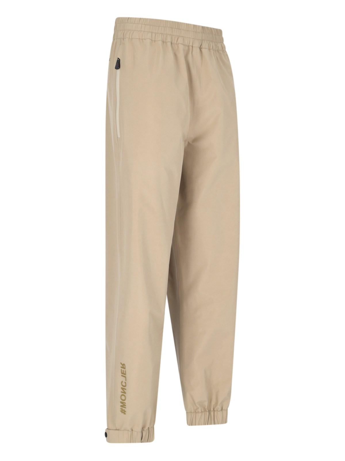 Shop Moncler Logo Track Pants In Beige