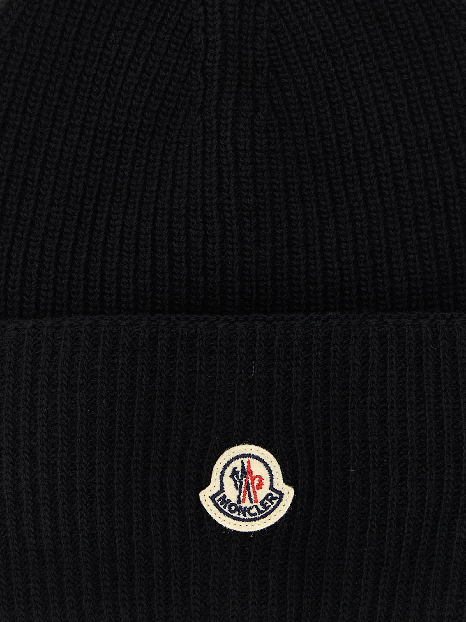 Moncler Ribbed Knit Carded Wool Beanie With Felt Logo Patch In Black