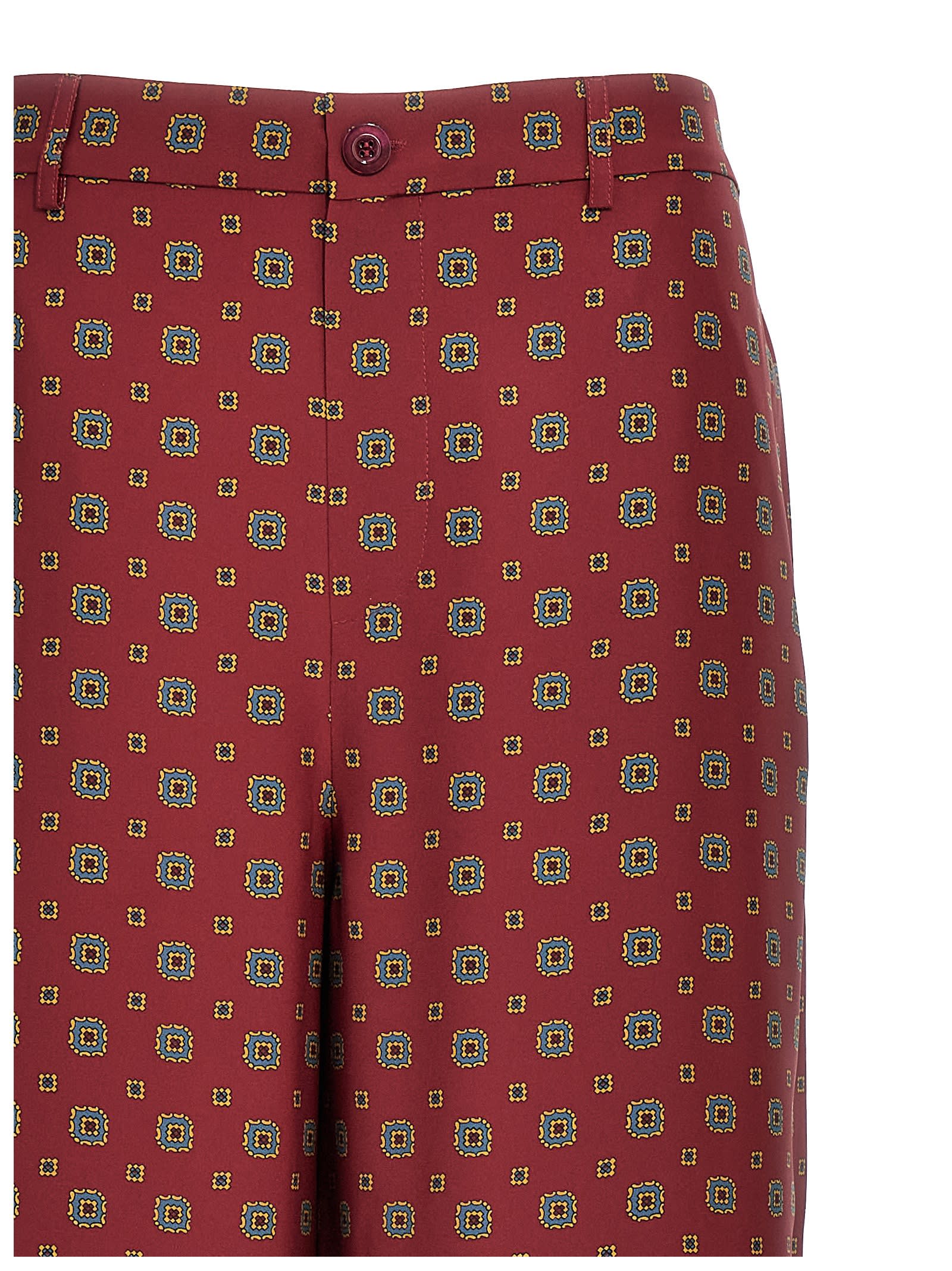 Shop Moschino Patterned Pants In Bordeaux