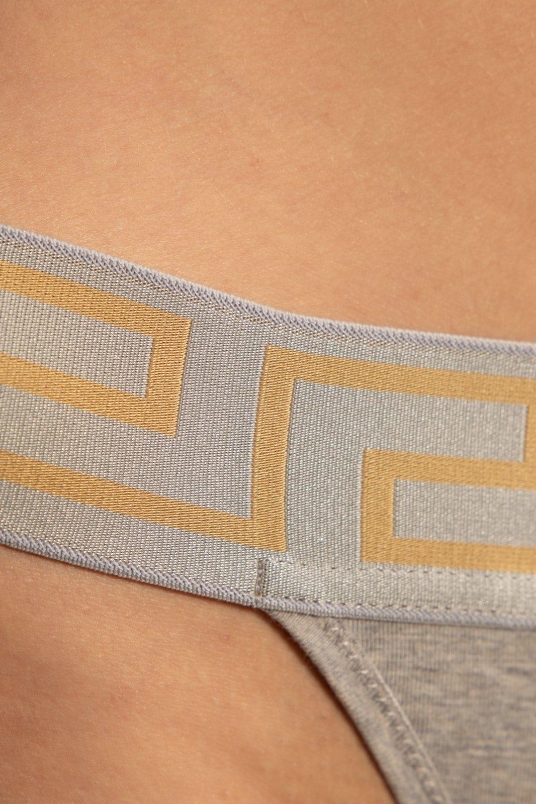 Shop Versace Logo Detailed Thong In Grey