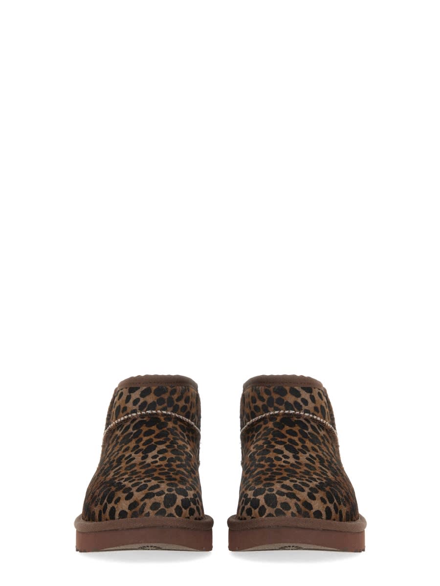 Shop Ugg Boot Classic Ultra Mini Caspian In Brown