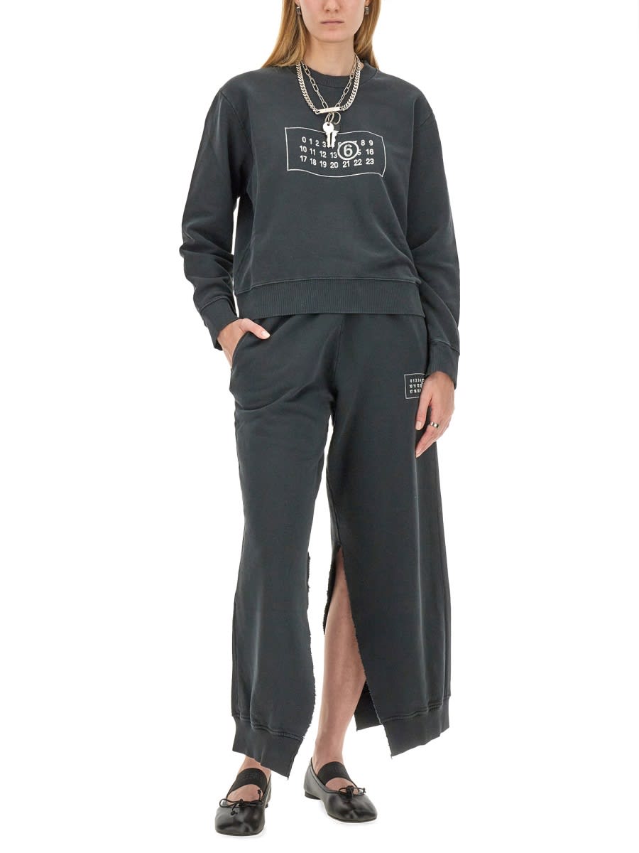 Shop Mm6 Maison Margiela Jogging Pants In Black