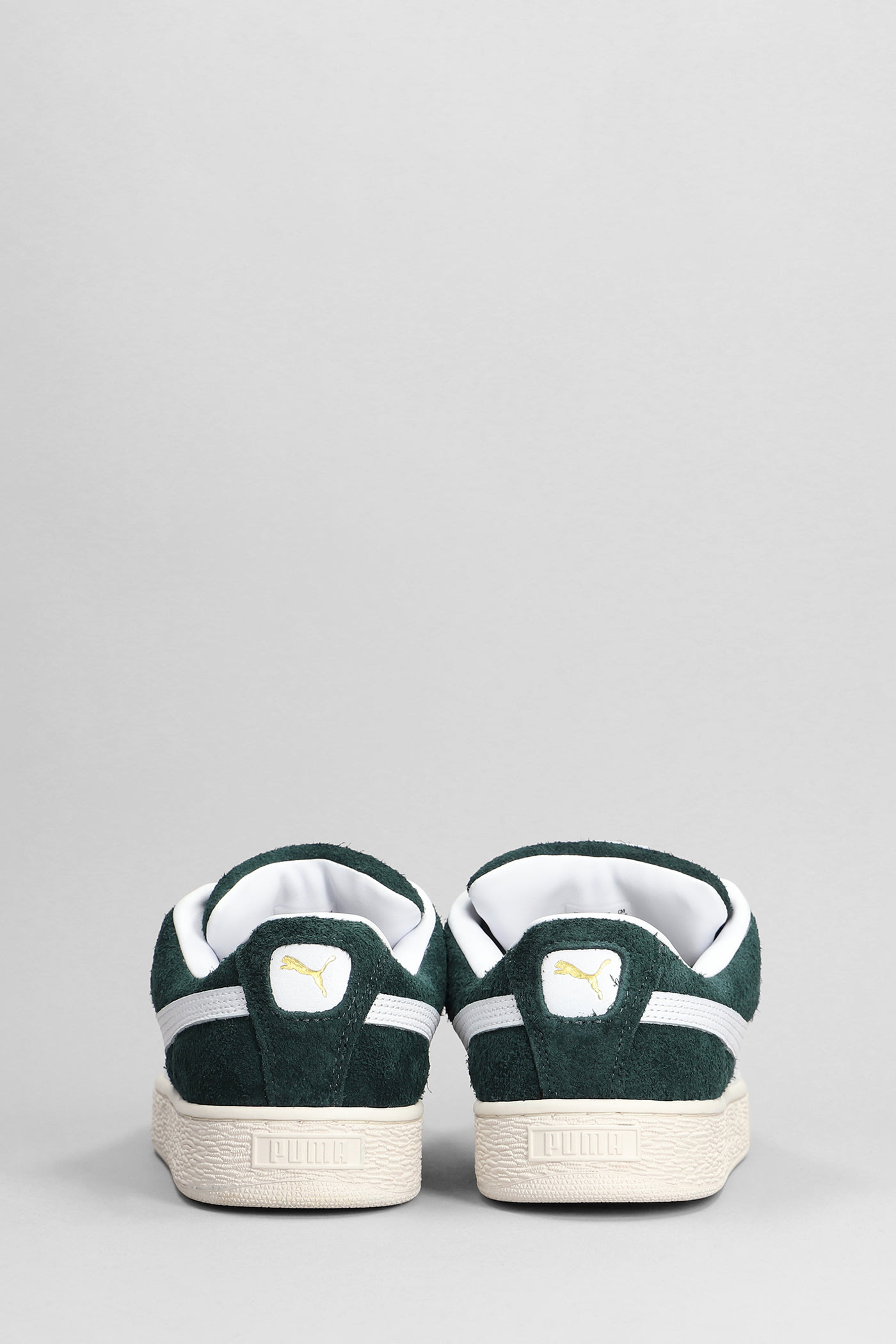 Puma Clyde Low-top Suede Sneakers In Ponderosa Pine Frosted Ivory