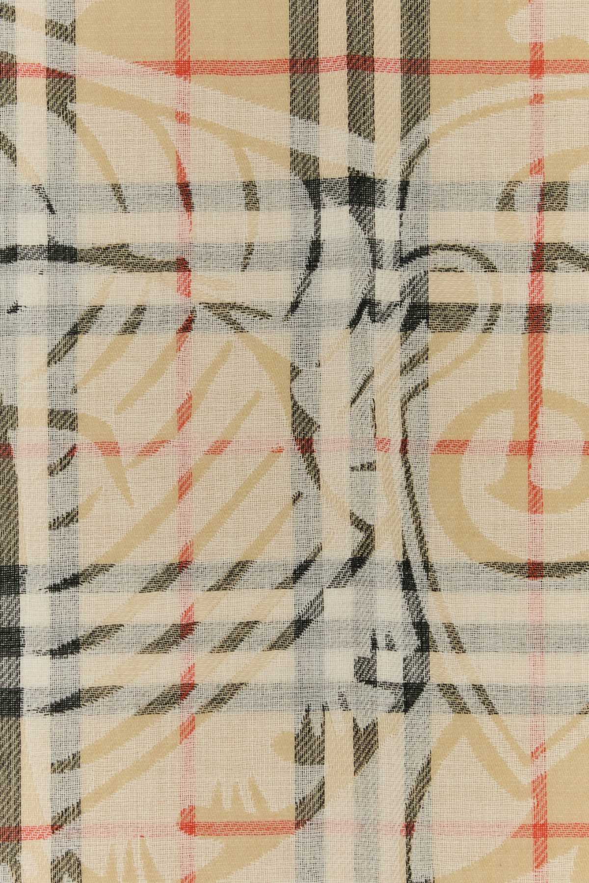 Burberry Wool Scarf With Embroidered Check Pattern And Fringed Edges In Sand
