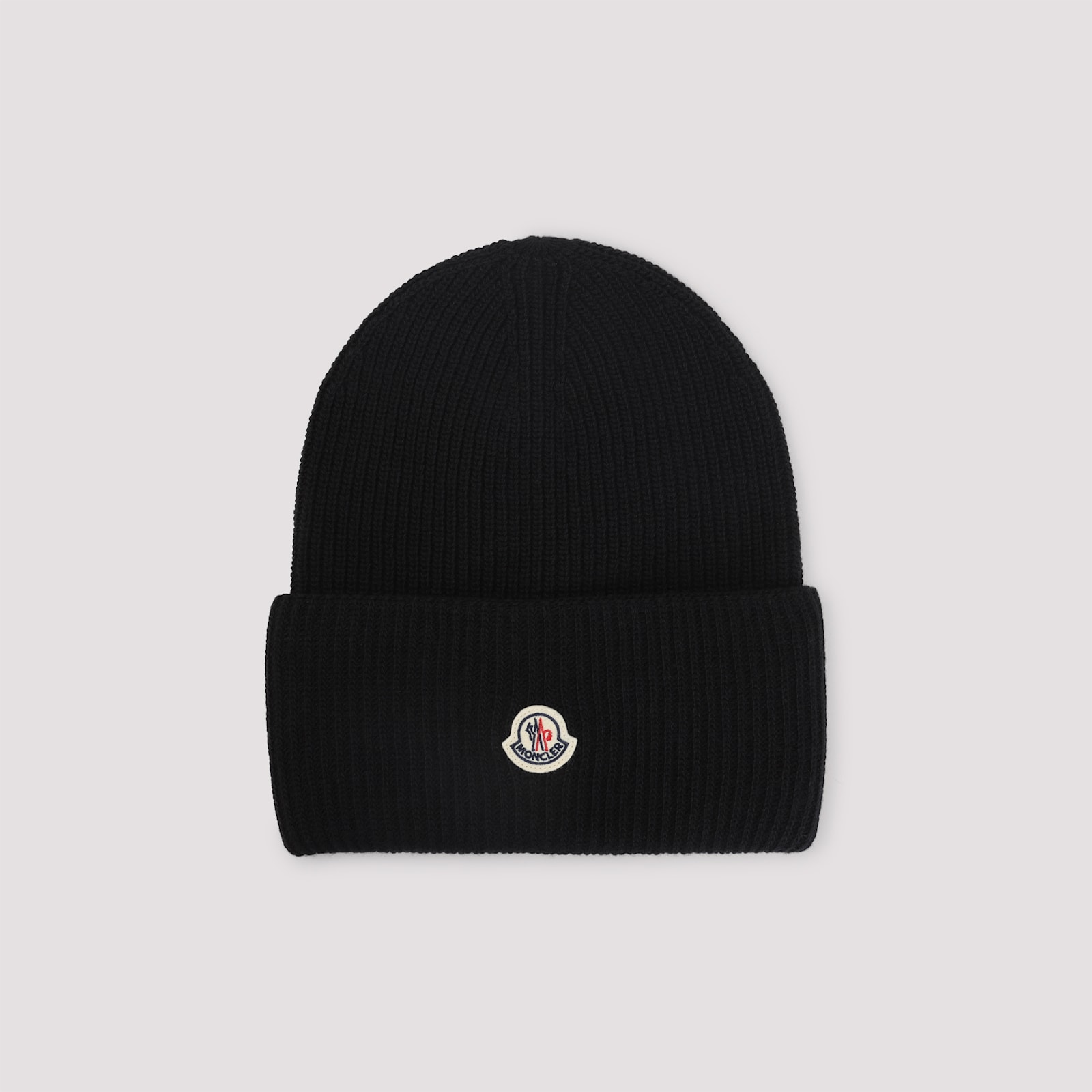 Moncler Ribbed Knit Carded Wool Beanie With Felt Logo Patch In Black