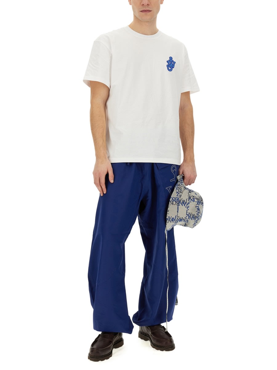 Shop Jw Anderson Joggers Pants With Logo Anchor In Blue