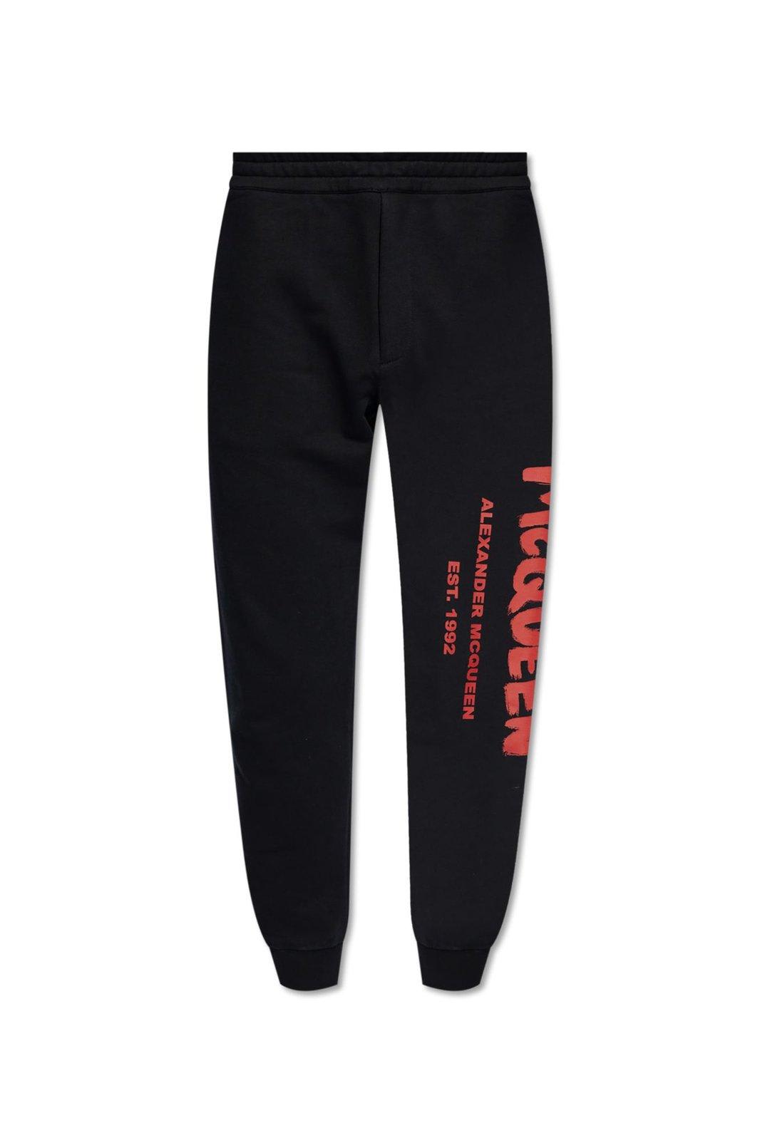 Shop Alexander Mcqueen Graffiti Printed Track Trousers In Black