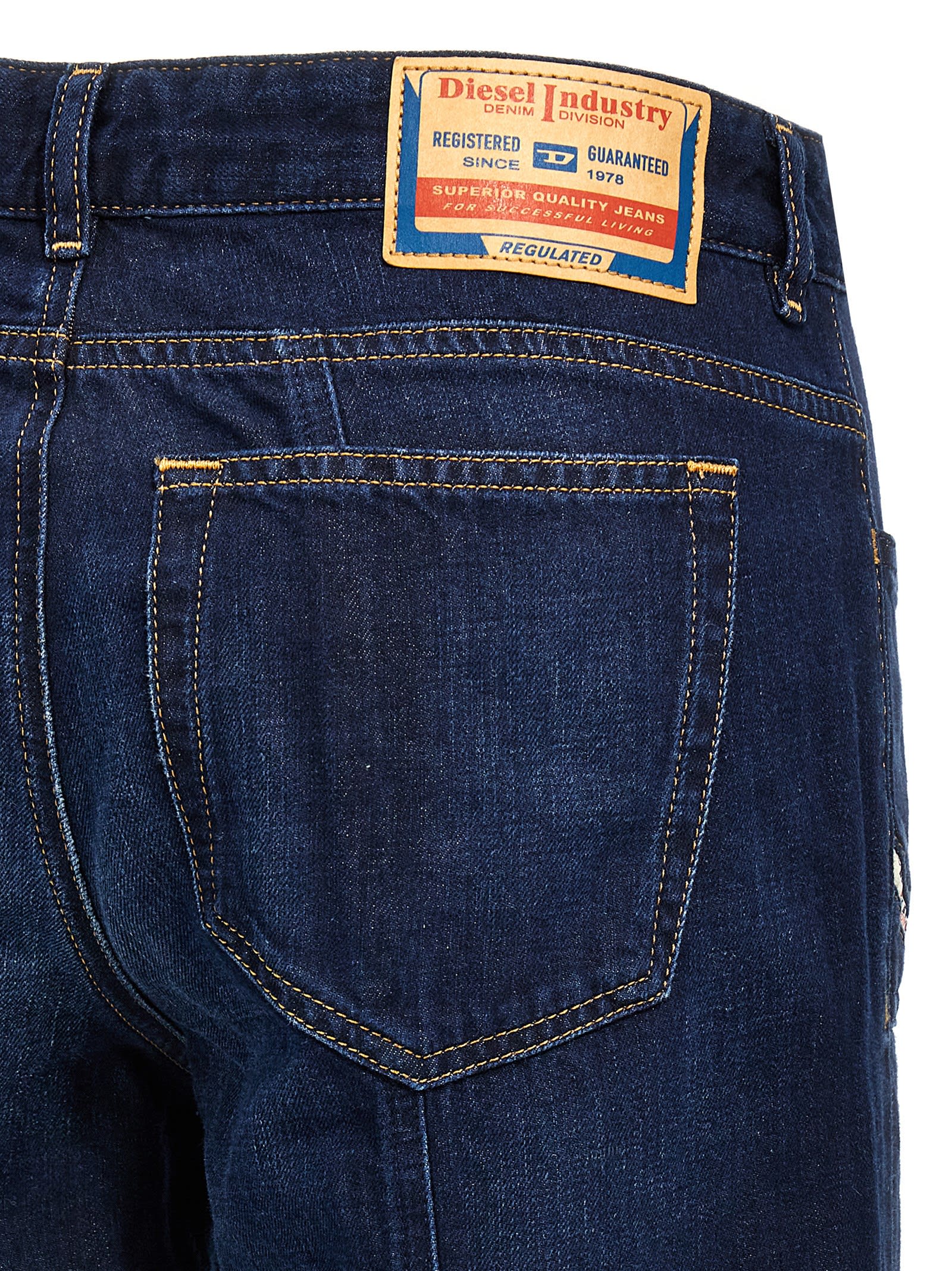 Diesel Faded Wash Flared Denim Trousers In Blue