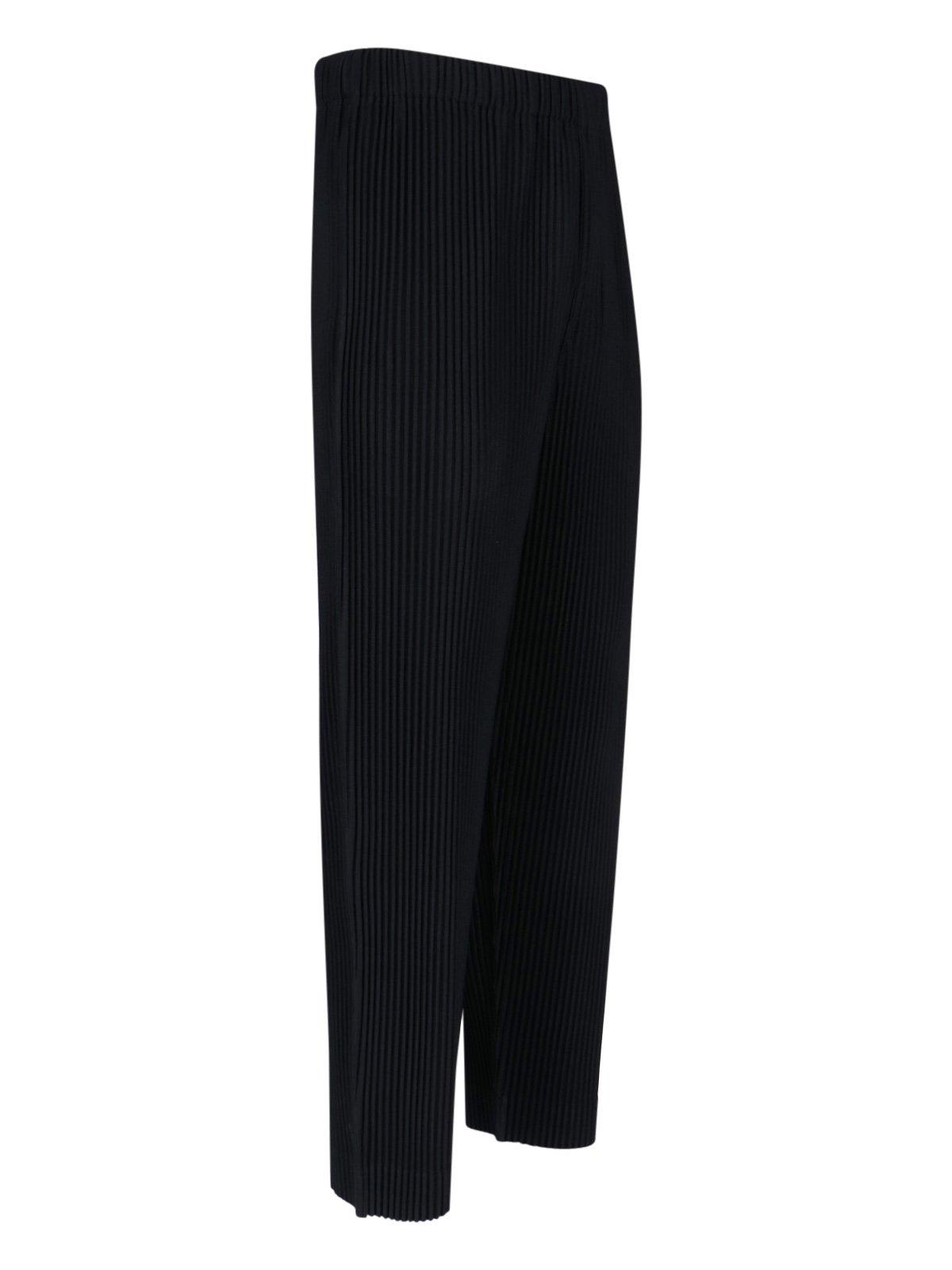 ISSEY MIYAKE PLEATED TAPERED LEG TROUSERS