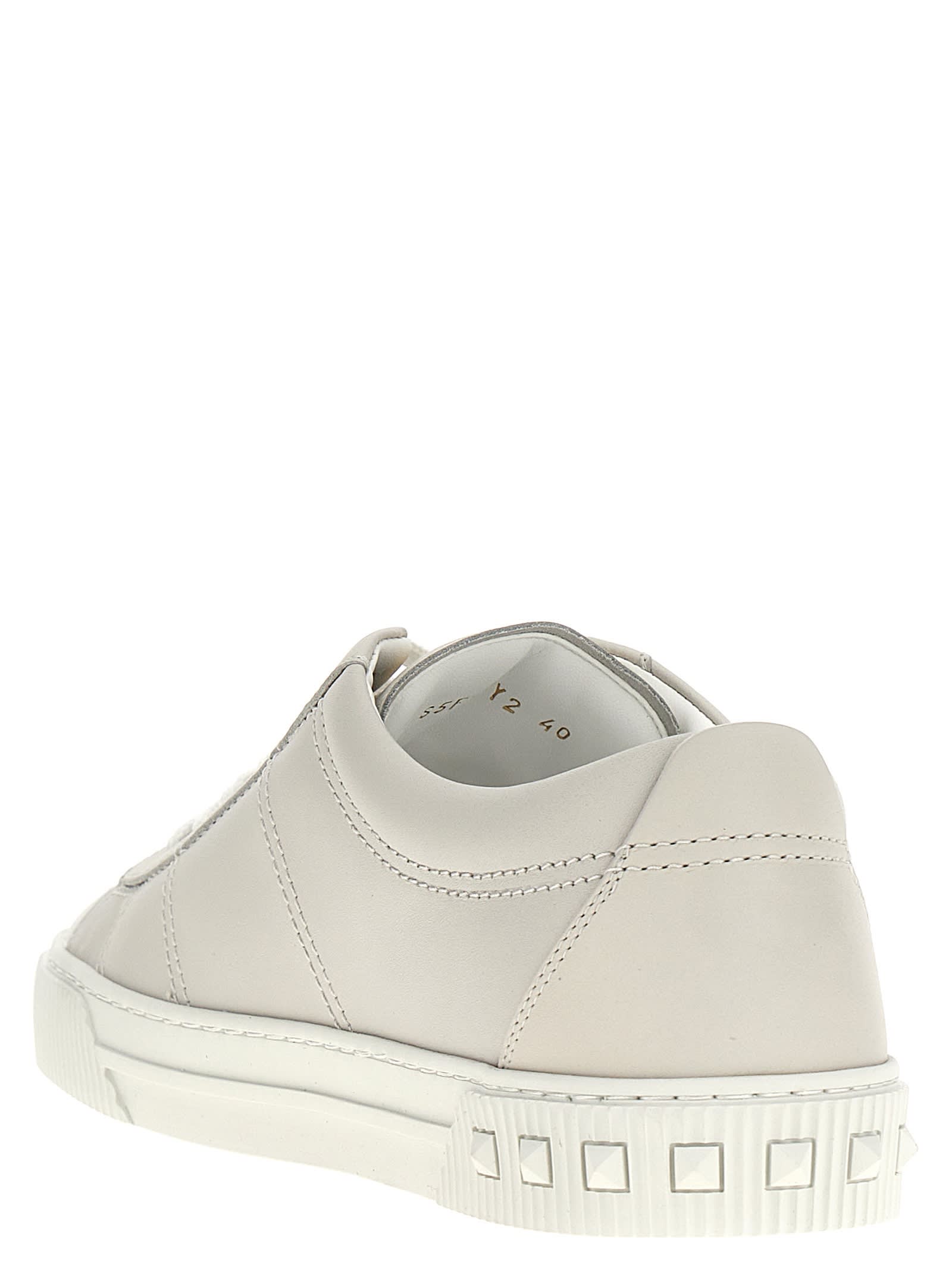 Shop Valentino Garavani Cityplanet Sneakers In White