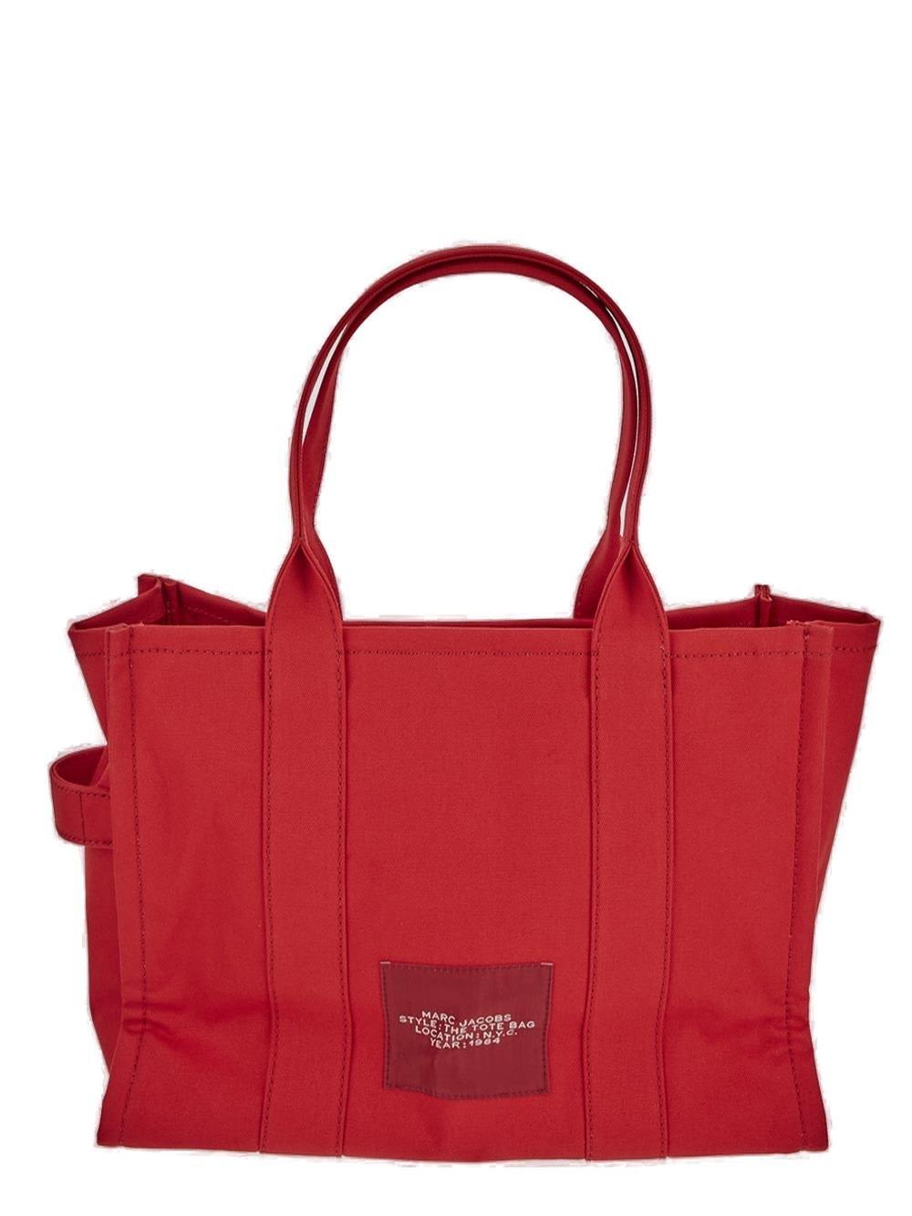 Shop Marc Jacobs The Traveler Tote Bag In True Red