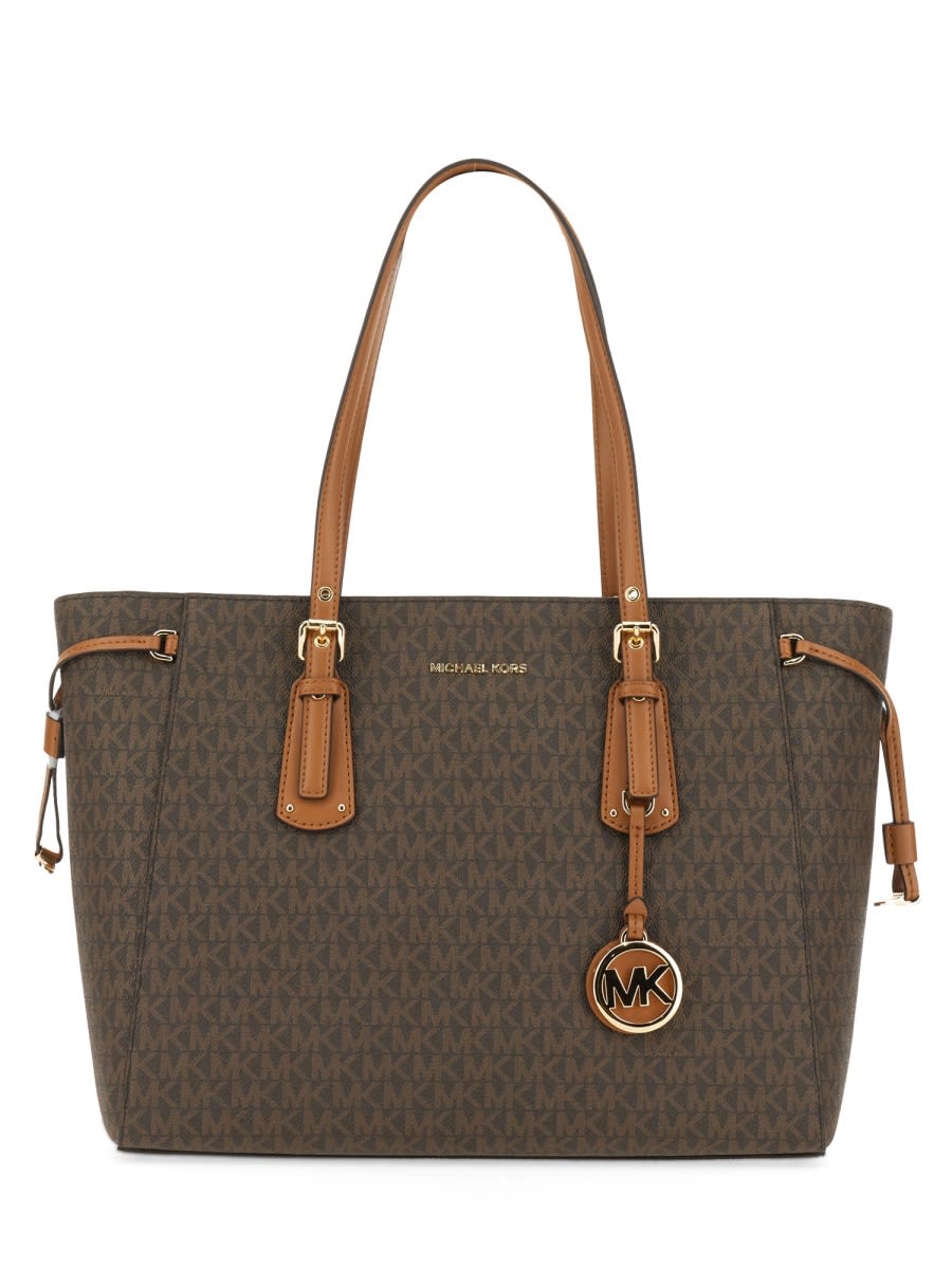 Shop Michael Kors Voyager Medium Tote Bag In Brown