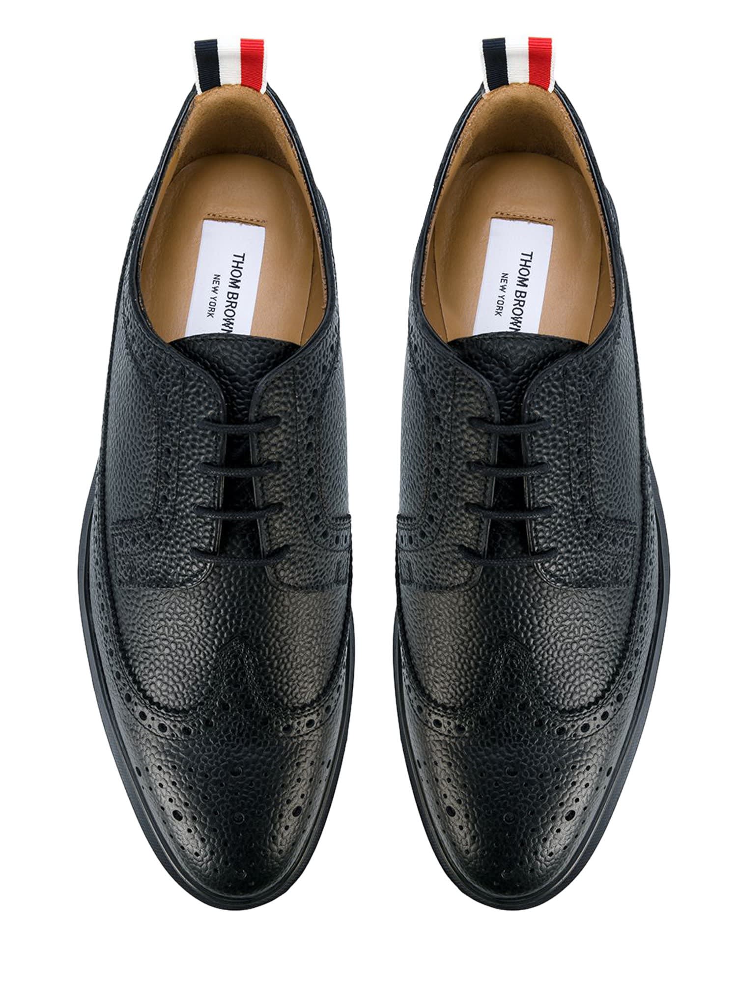 Shop Thom Browne Long Wing Brogue Lace Up In Black