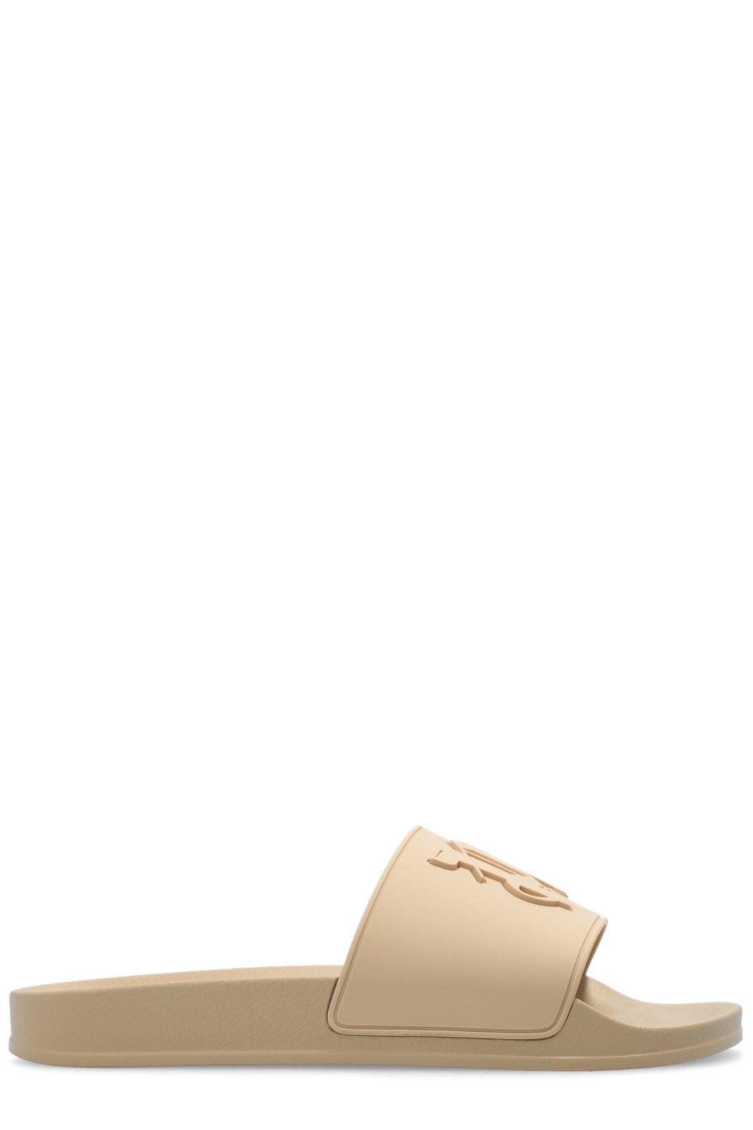 Palm Angels Logo Monogram Embossed Pool Slides In Light Beige