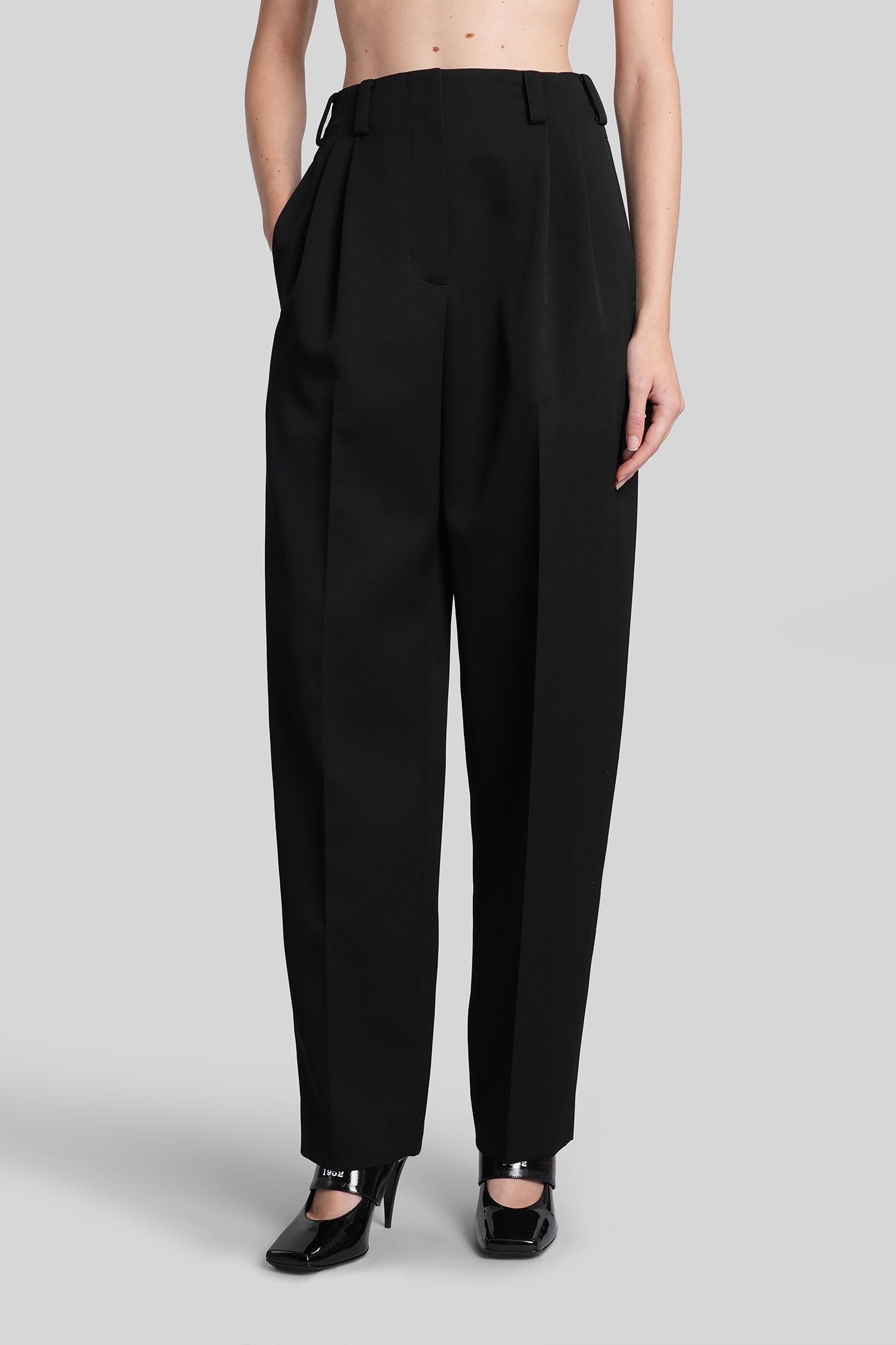 Givenchy Slashed Double-pleated Tapered-leg Trousers In Black