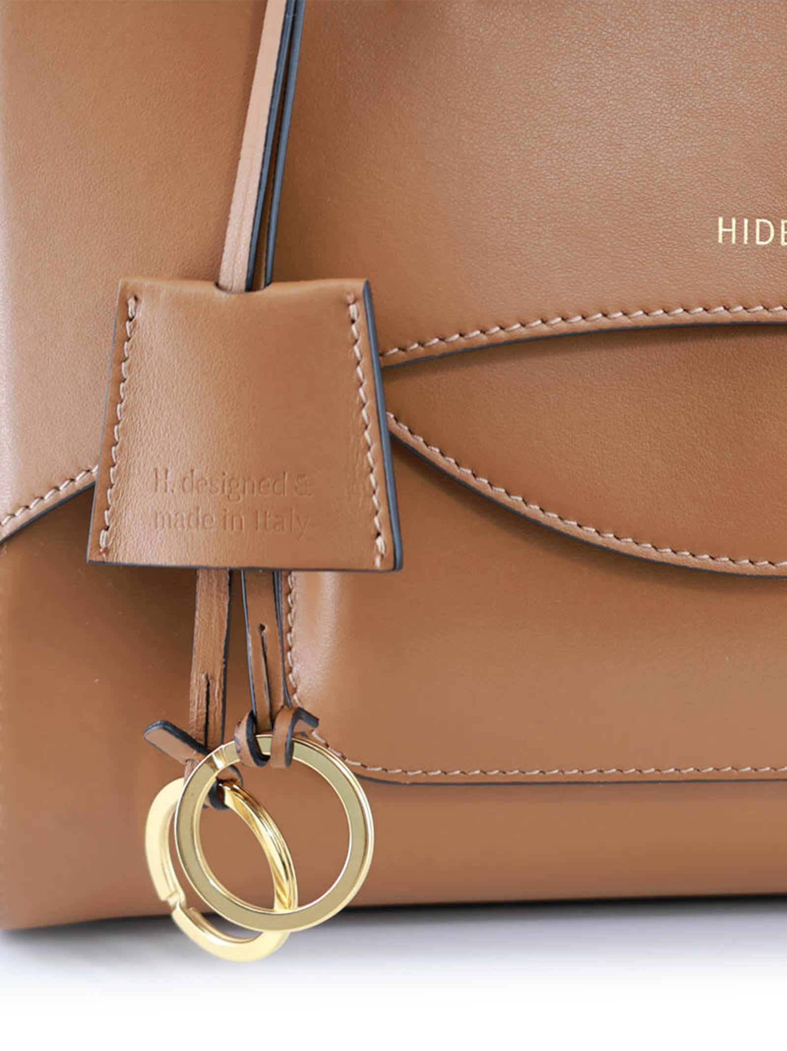 Hidesins Brown Handbag With Adjustable And Removable Shoulder Strap And Logo Lettering On The Front In Leathe In Brown