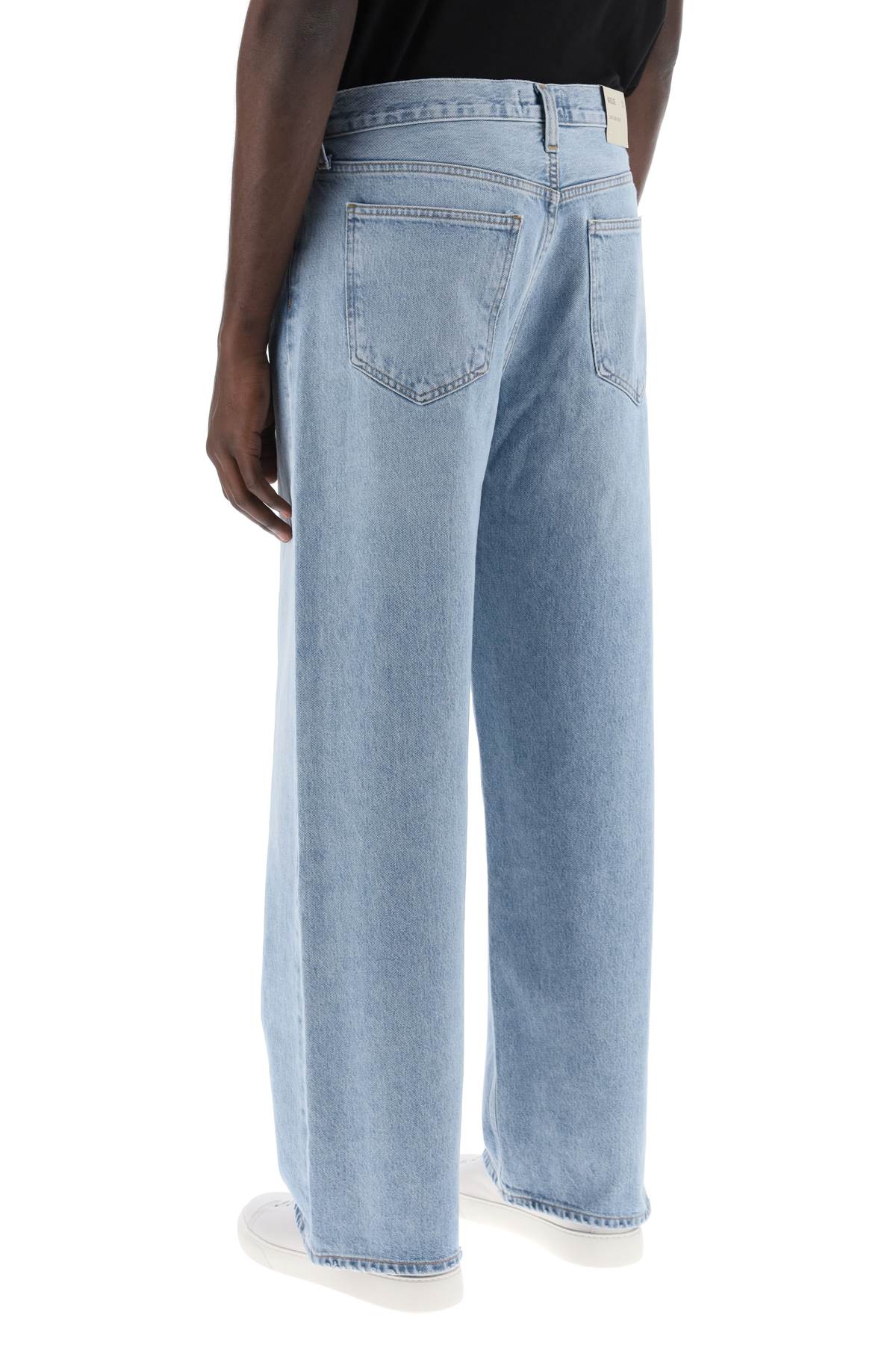 Shop Agolde Baggy Slung Jeans In Harmony (blue)